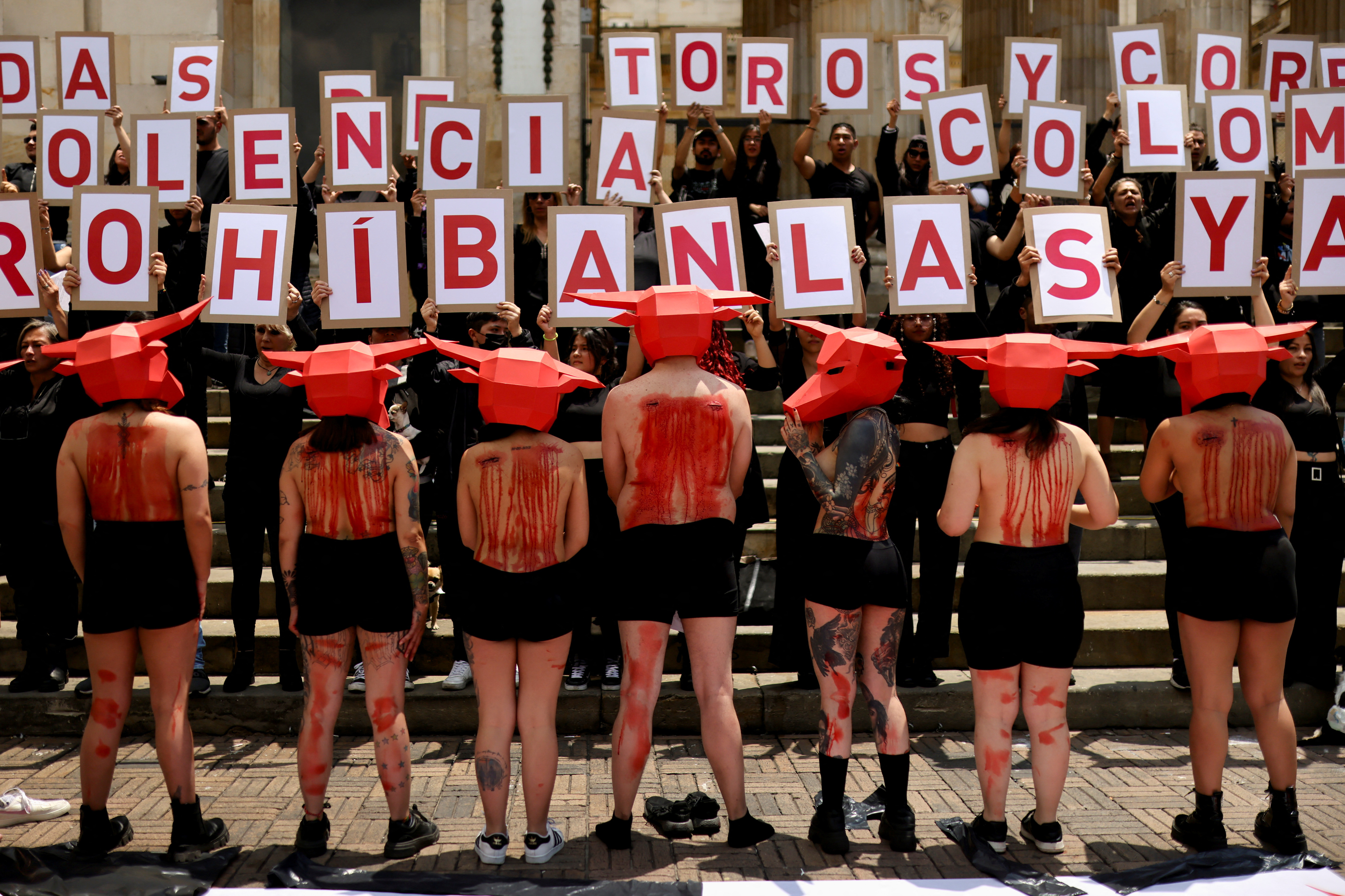 Activists protest against bullfighting, in Bogota