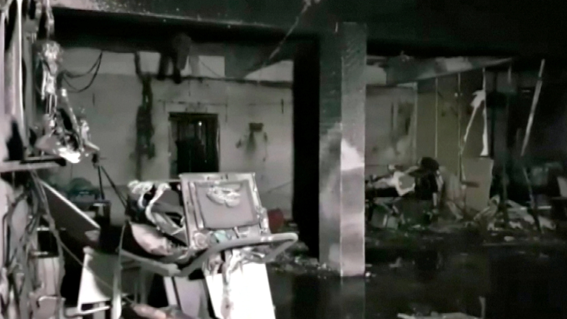 Video grab of damaged equipment and furniture in the burnt interior of a hospital treating coronavirus disease (COVID-19) patients, after a deadly fire, in India's western Gujarat state