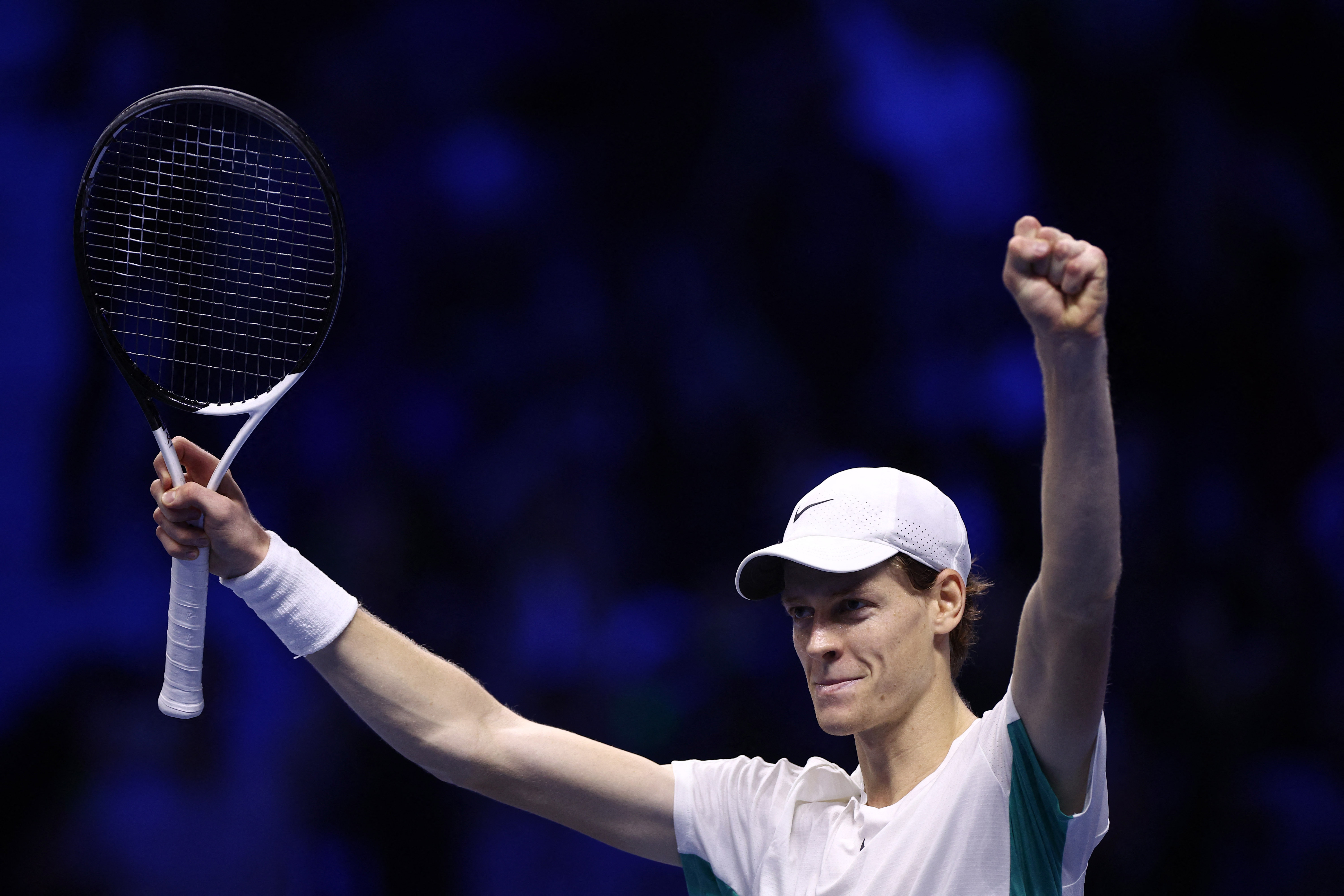 Jannik Sinner of Italy plays a forehand in his quarter final match