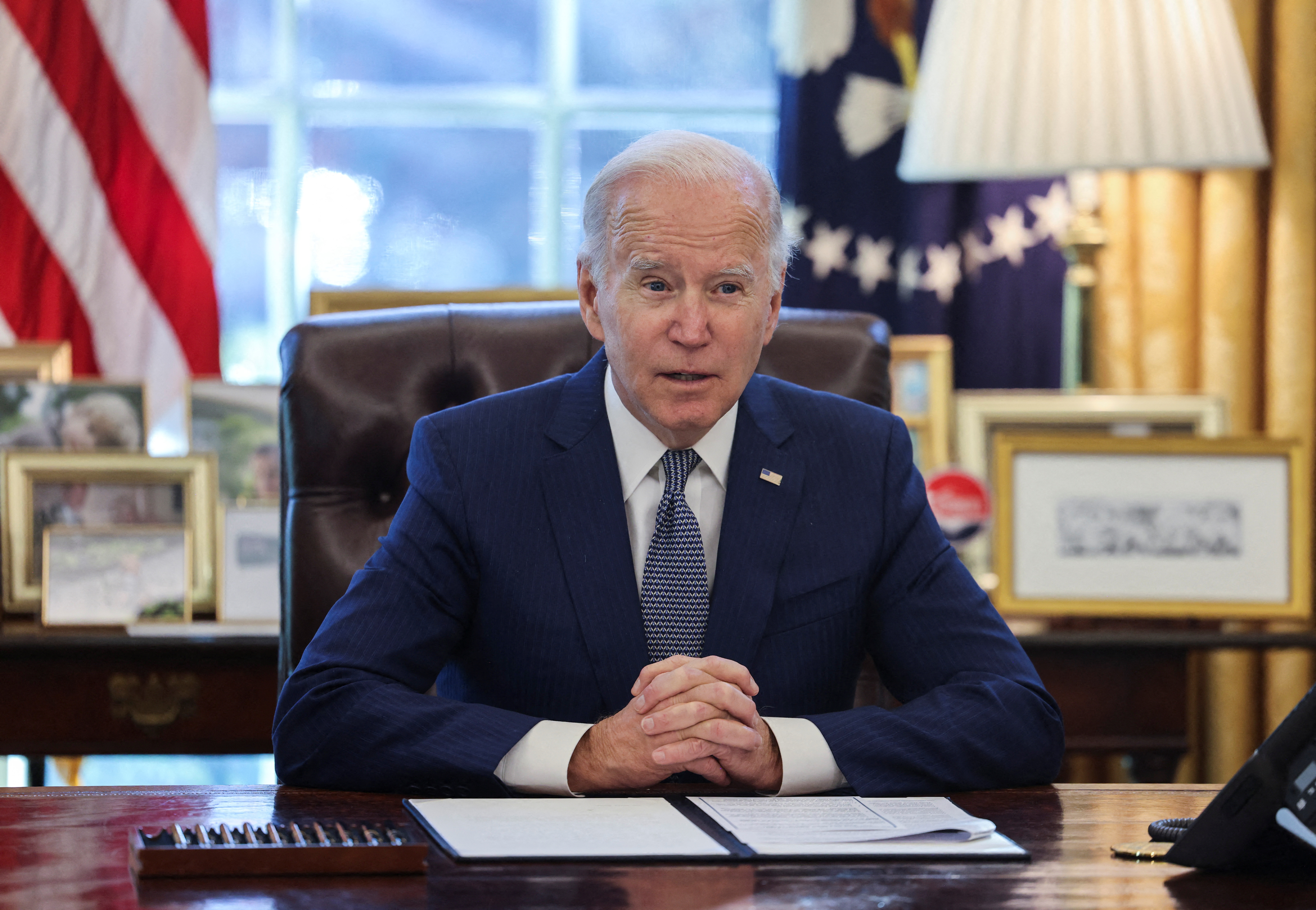U.S. President Joe Biden signs executive order on reducing government bureaucracy at the White House in Washington
