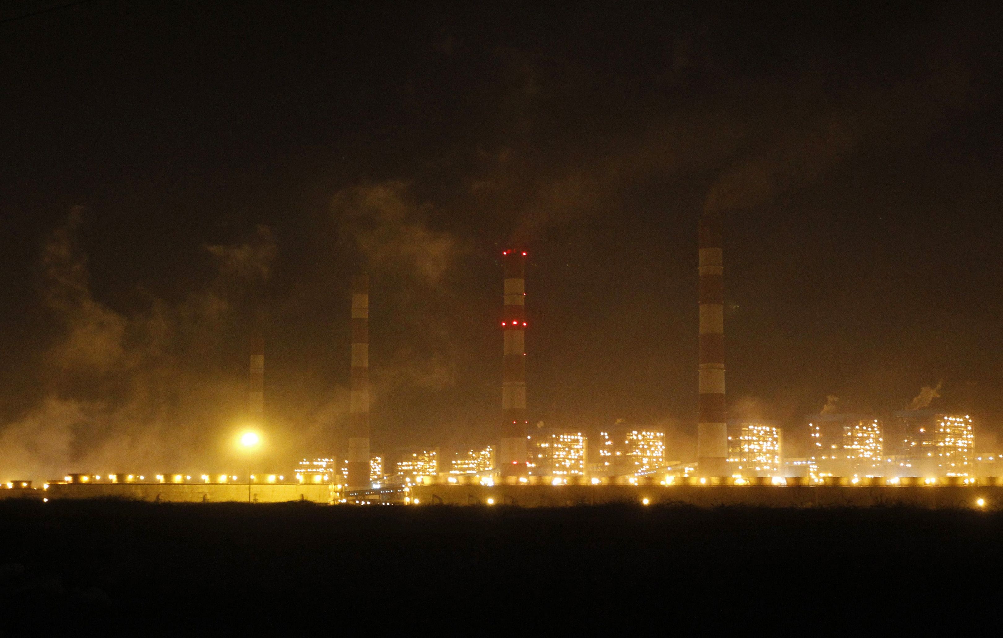 A general view of power plants of Adani Power is seen at Mundra town in the western Indian state of Gujarat
