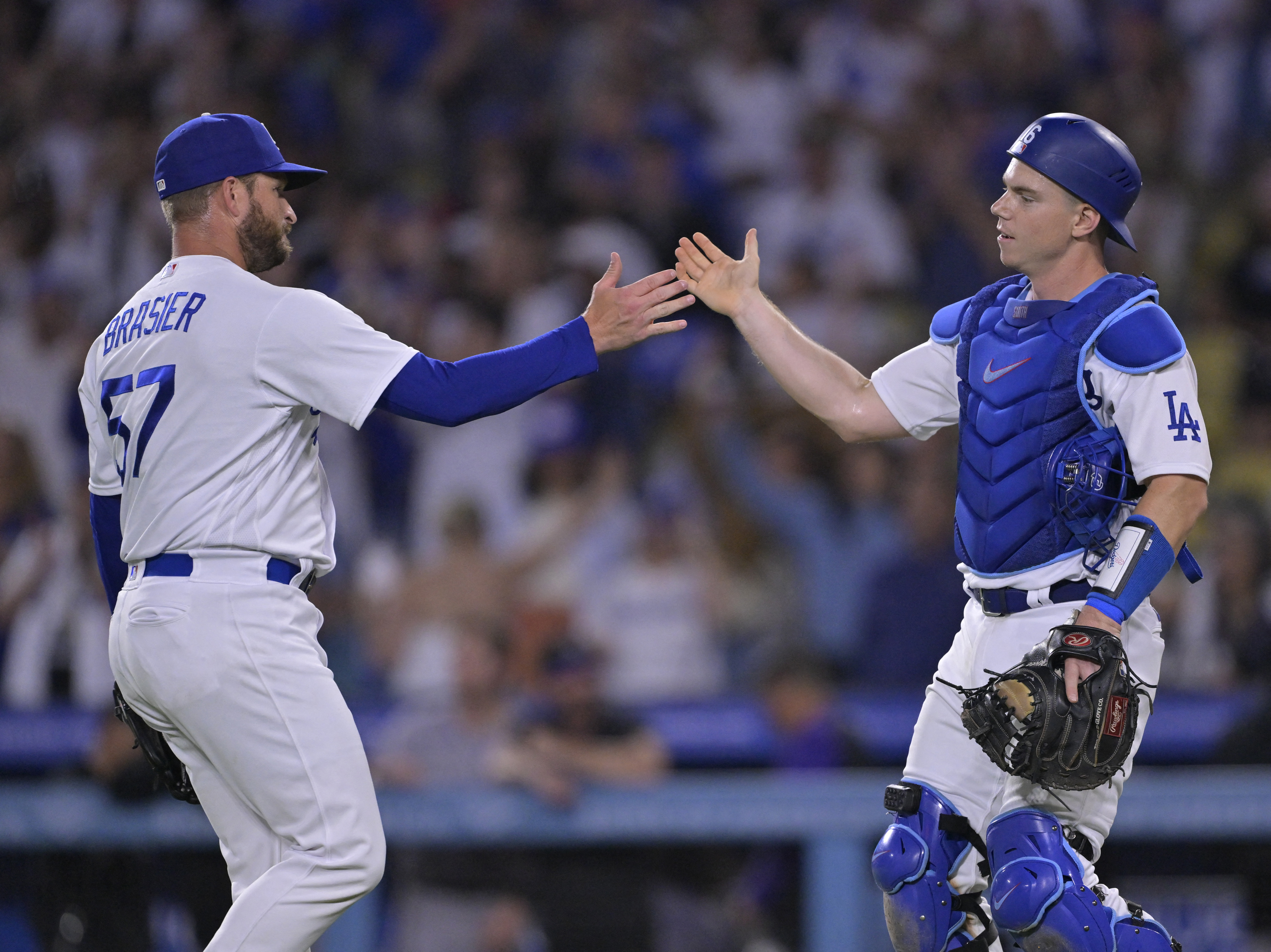 Dodgers use four-run sixth to tame Rockies, 6-1