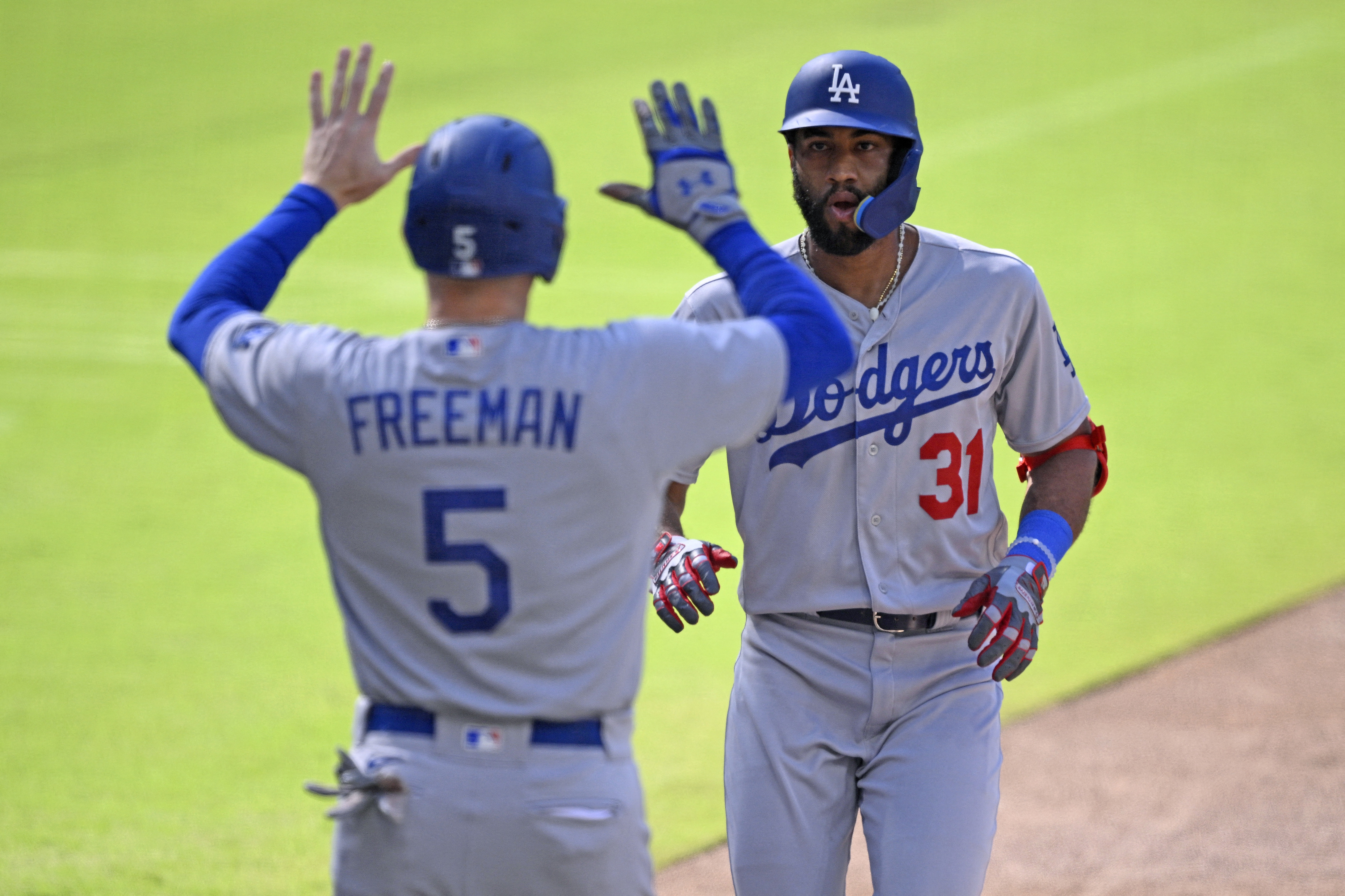 Freeman, Rosario and Betts homer to back Lynn in the Dodgers' 8-2