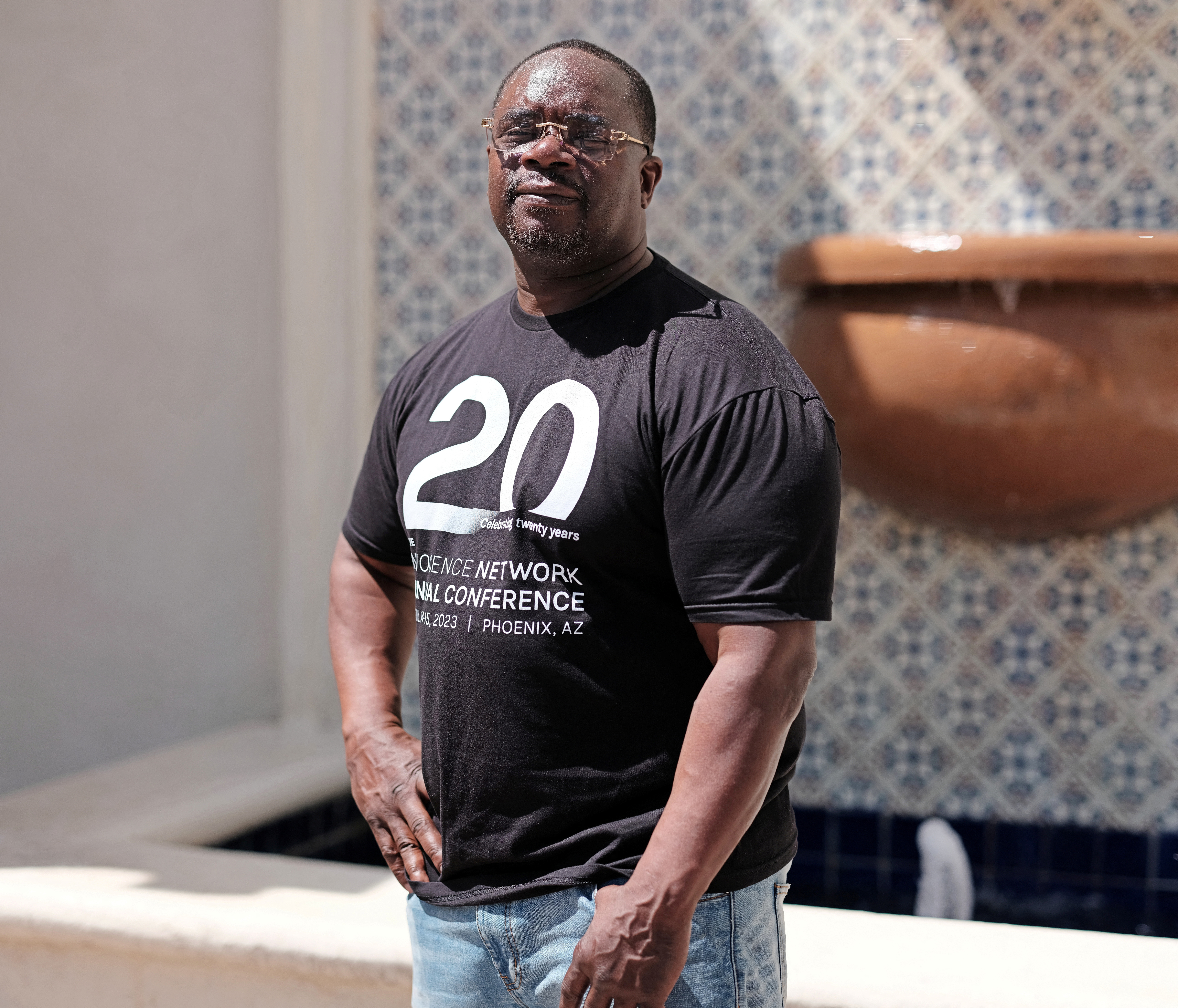 Rodney Roberts, who pleaded guilty to kidnapping for a crime he did not commit and was exonerated by DNA evidence, stands in Phoenix