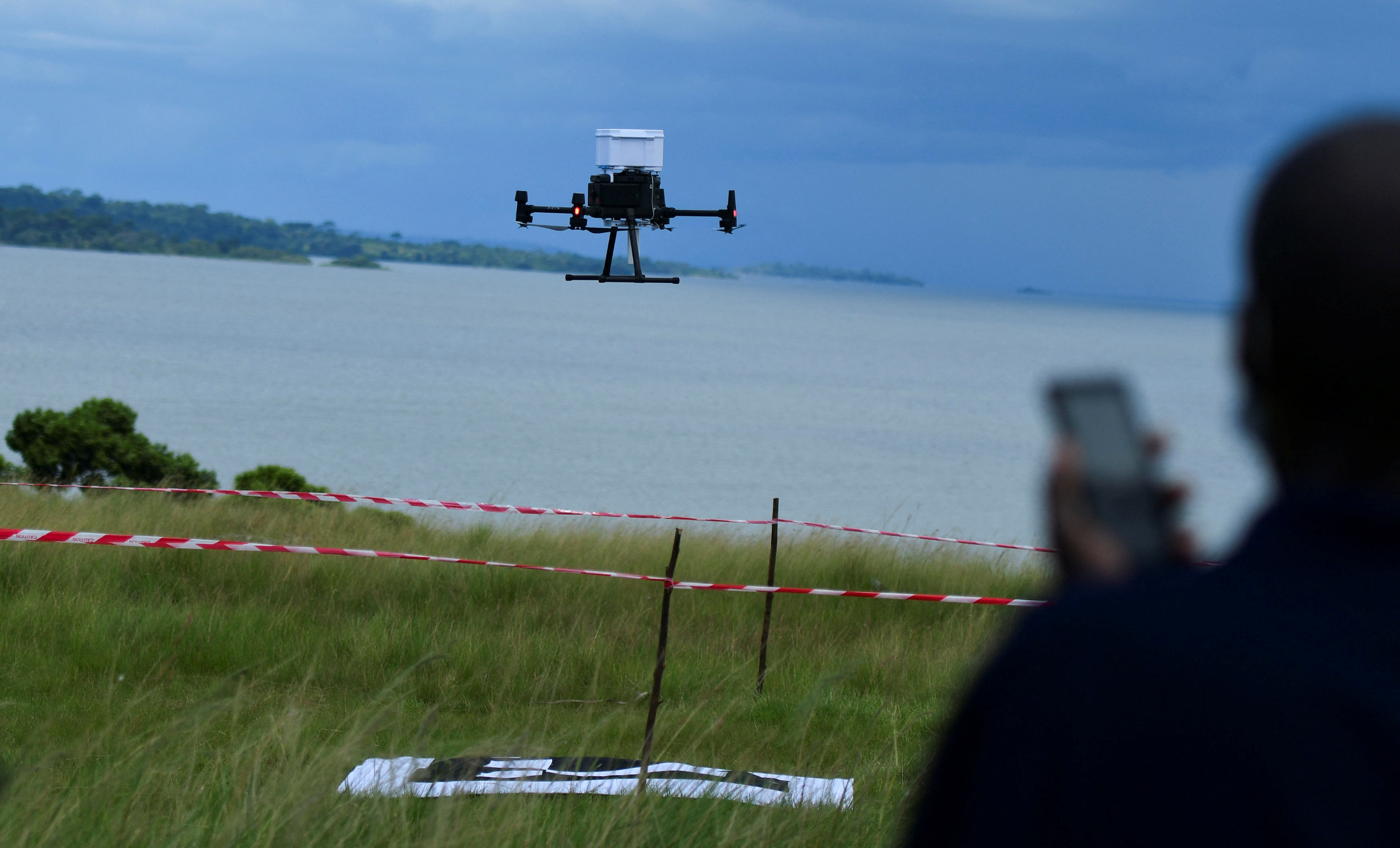 Uganda tests whether drones can transport HIV medicine faster, in Kalangala