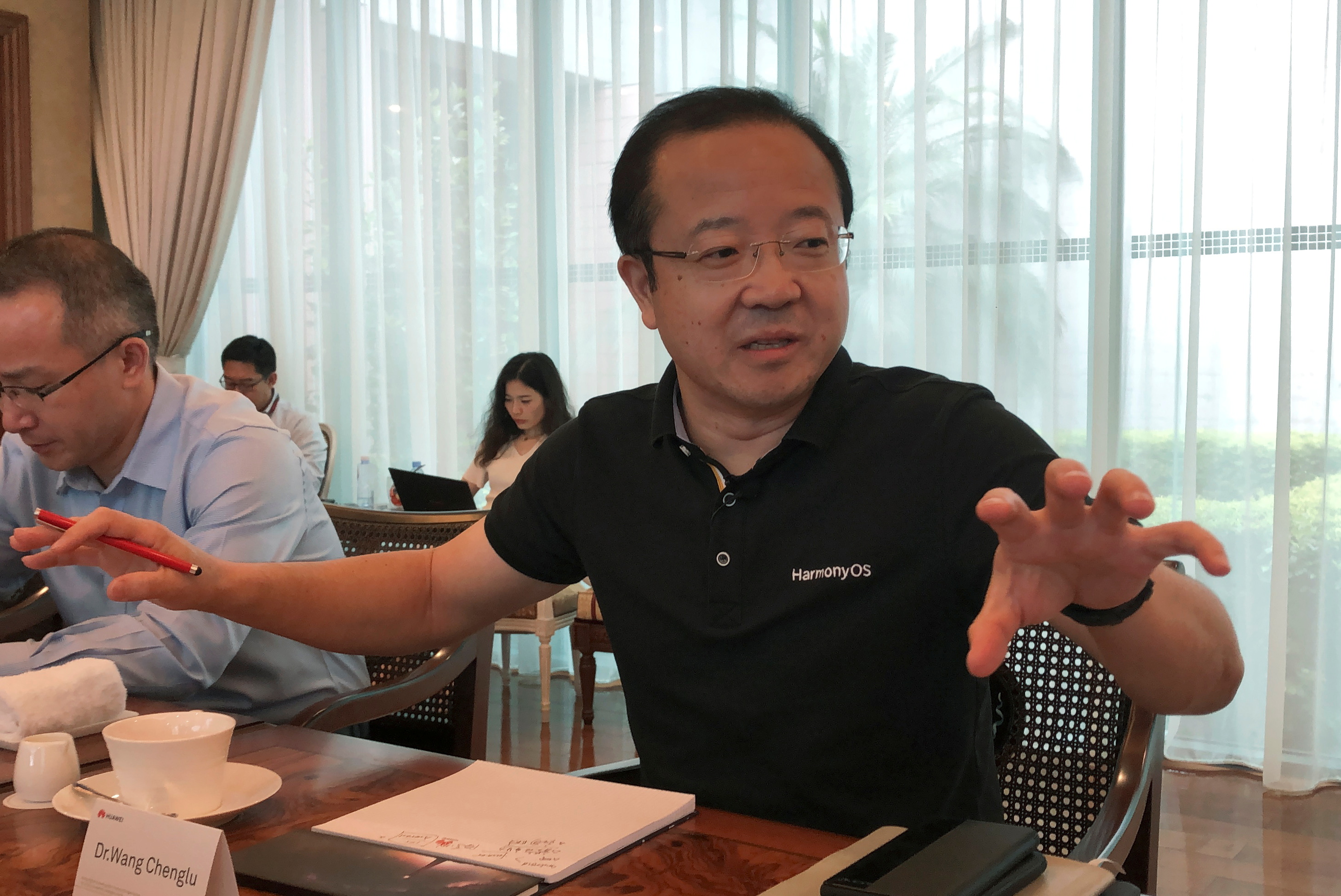 Wang Chenglu, president of Huawei Consumer Business Group's Software Department, talks about the HarmonyOS operating system during a media roundtable at the Huawei headquarters in Shenzhen, Guangdong province, China June 1, 2021. Picture taken June 1, 2021. REUTERS/David Kirton