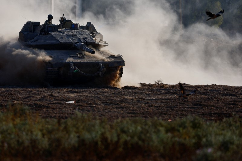 Israeli tank manouvers near the Israel-Gaza border, in Israel