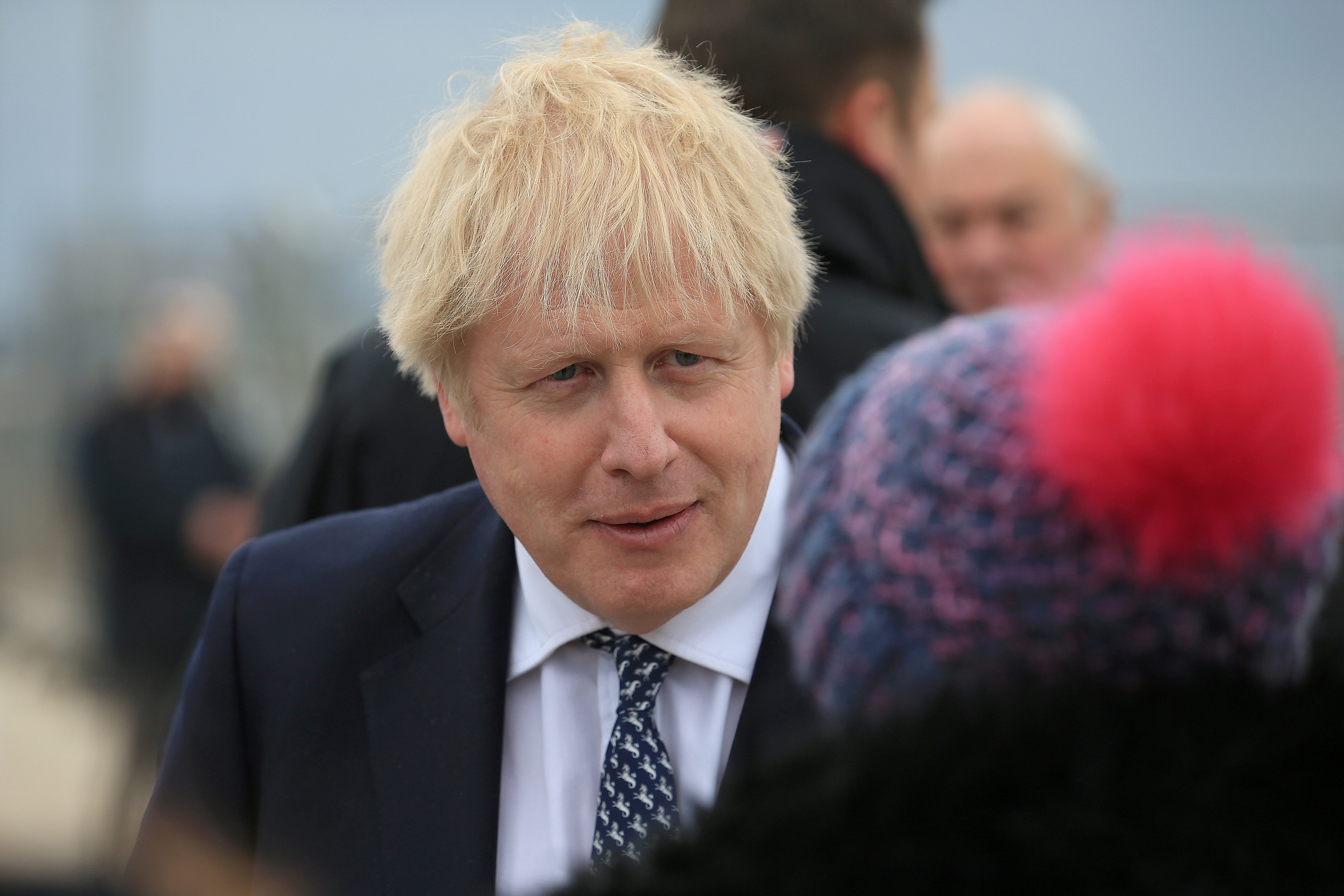 Britain's Prime Minister Boris Johnson speaks to a member of the public as he campaigns on behalf of Conservative Party candidate Jill Mortimer in Hartlepool