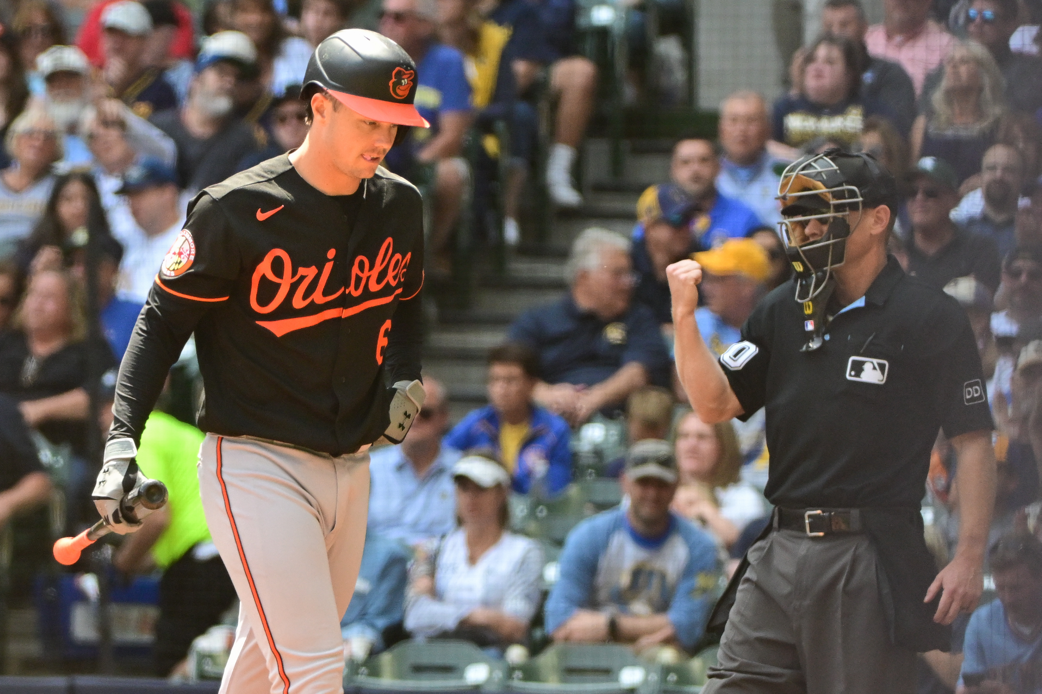 Orioles rally late to upend Brewers, salvage finale