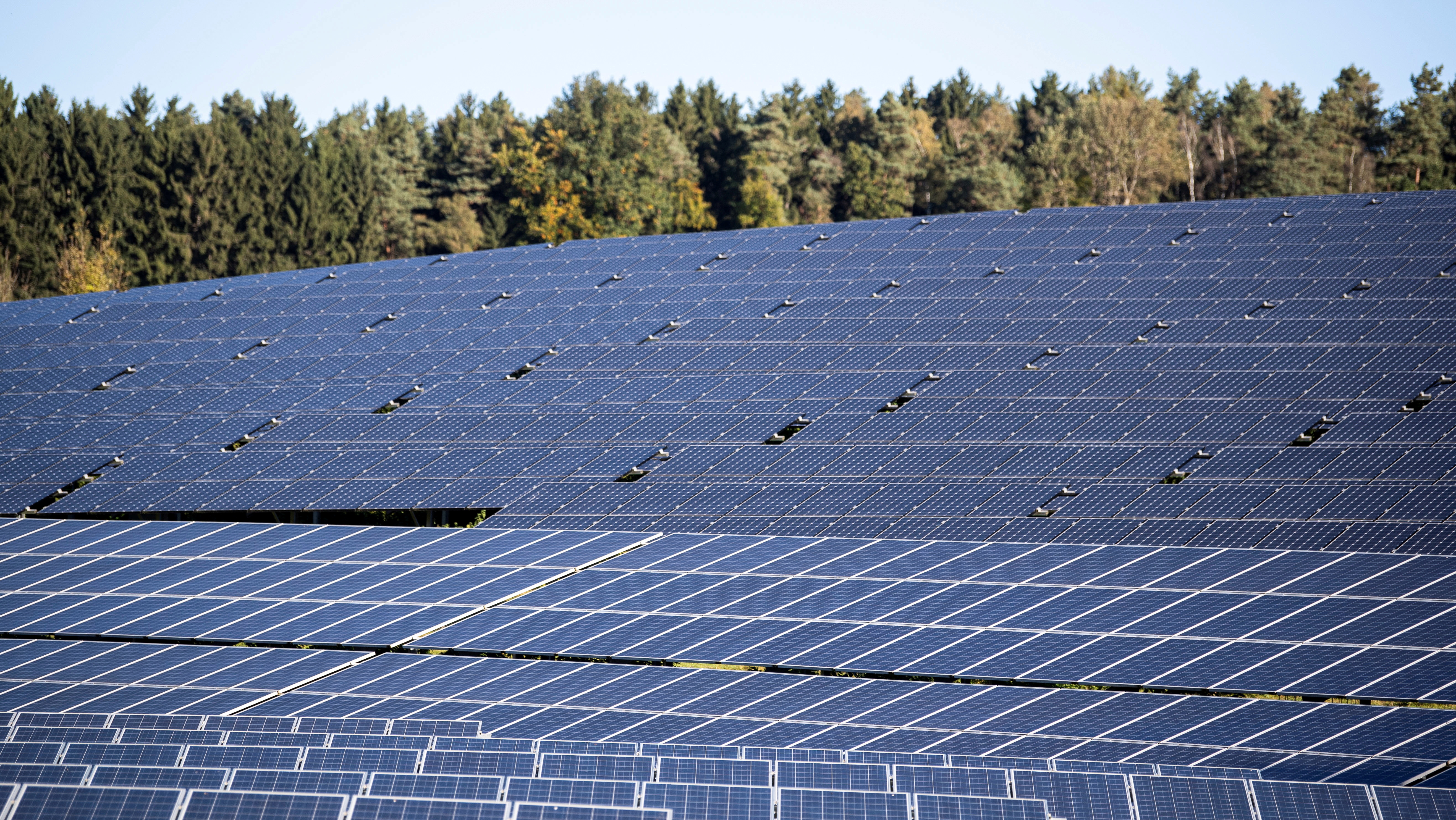A solar power plant with photovoltaic systems is seen near Mainburg