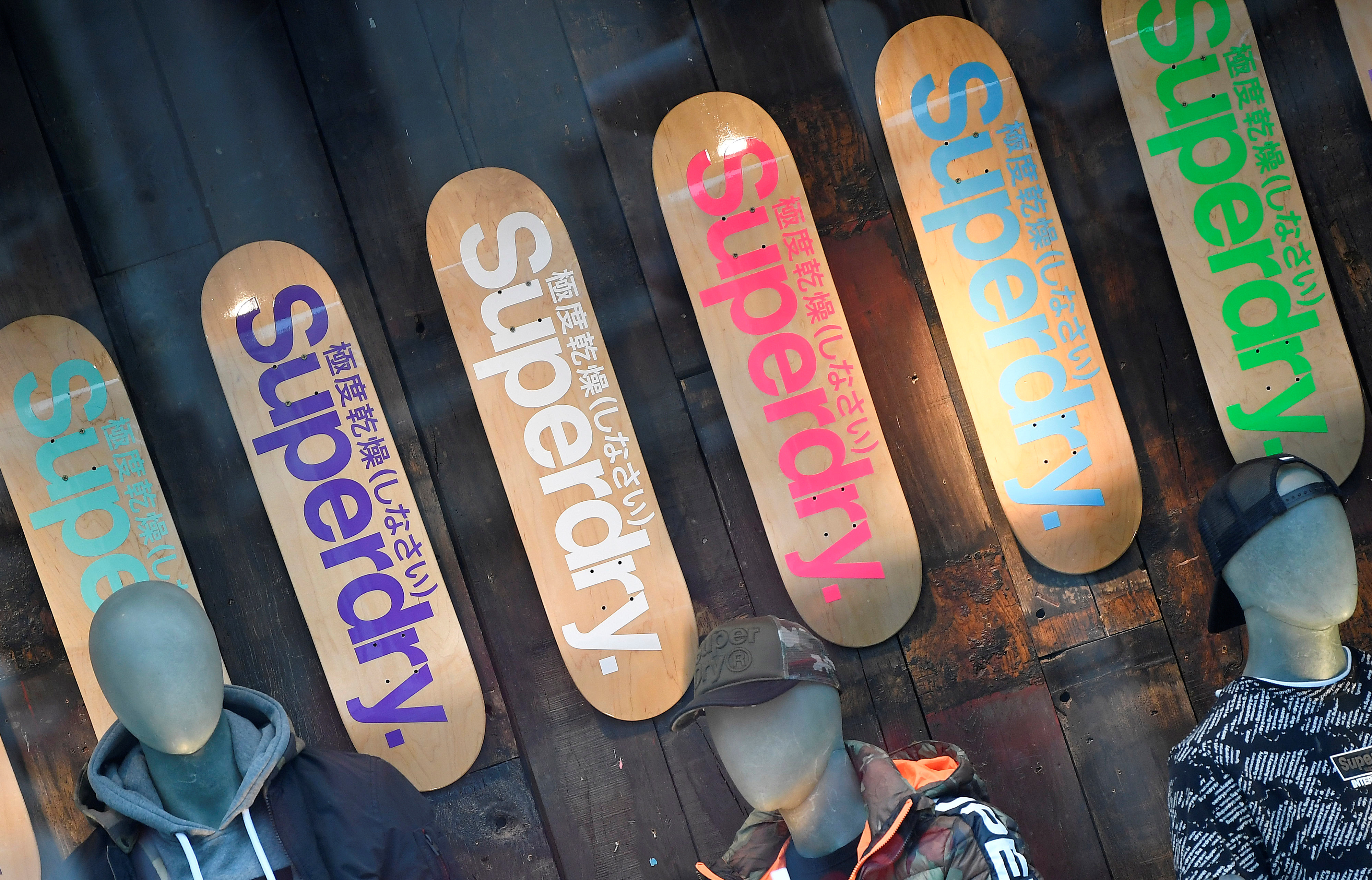 A window display is seen at a Superdry store in London