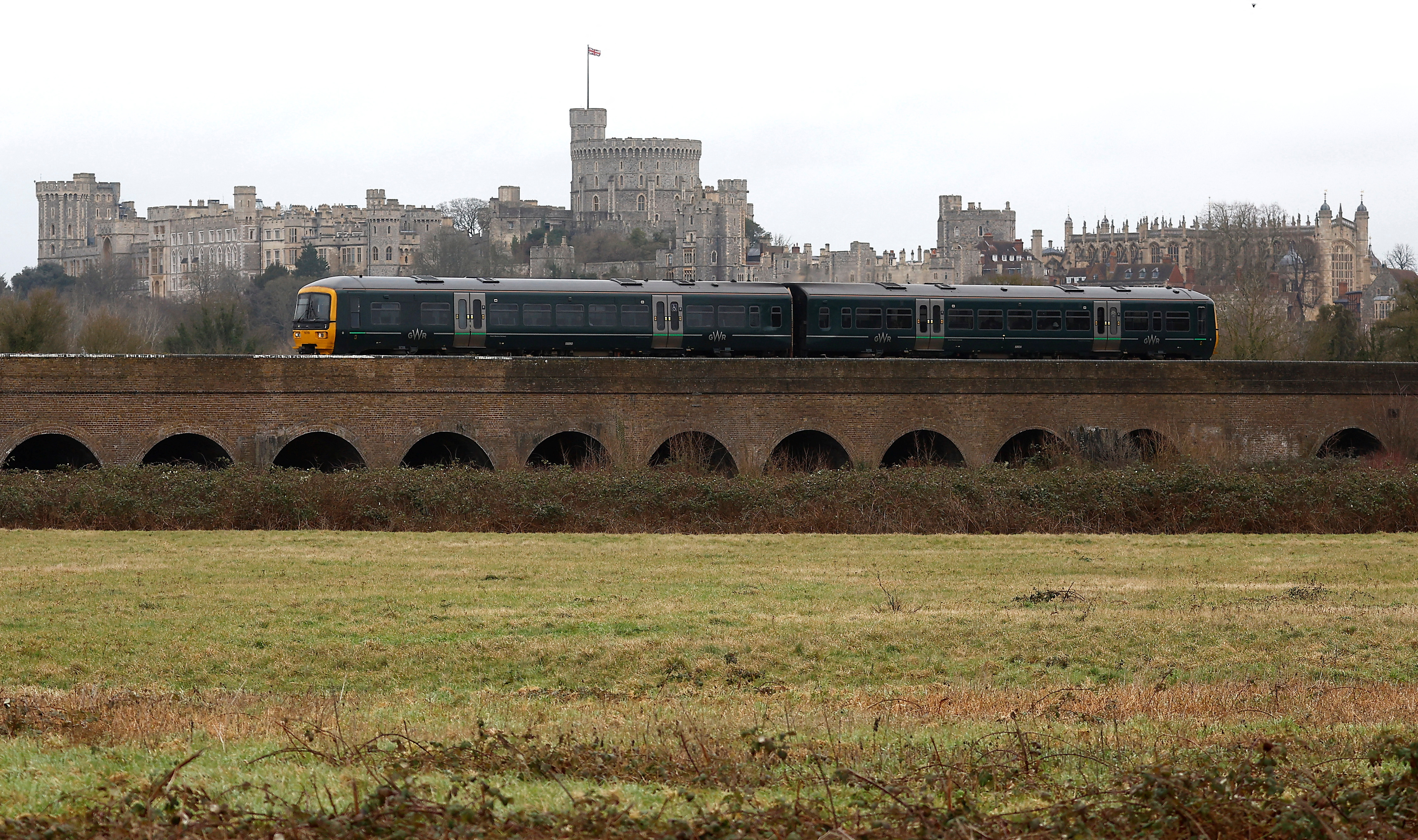 A Great Western Railway train passes in front of Windsor Castle in Eton