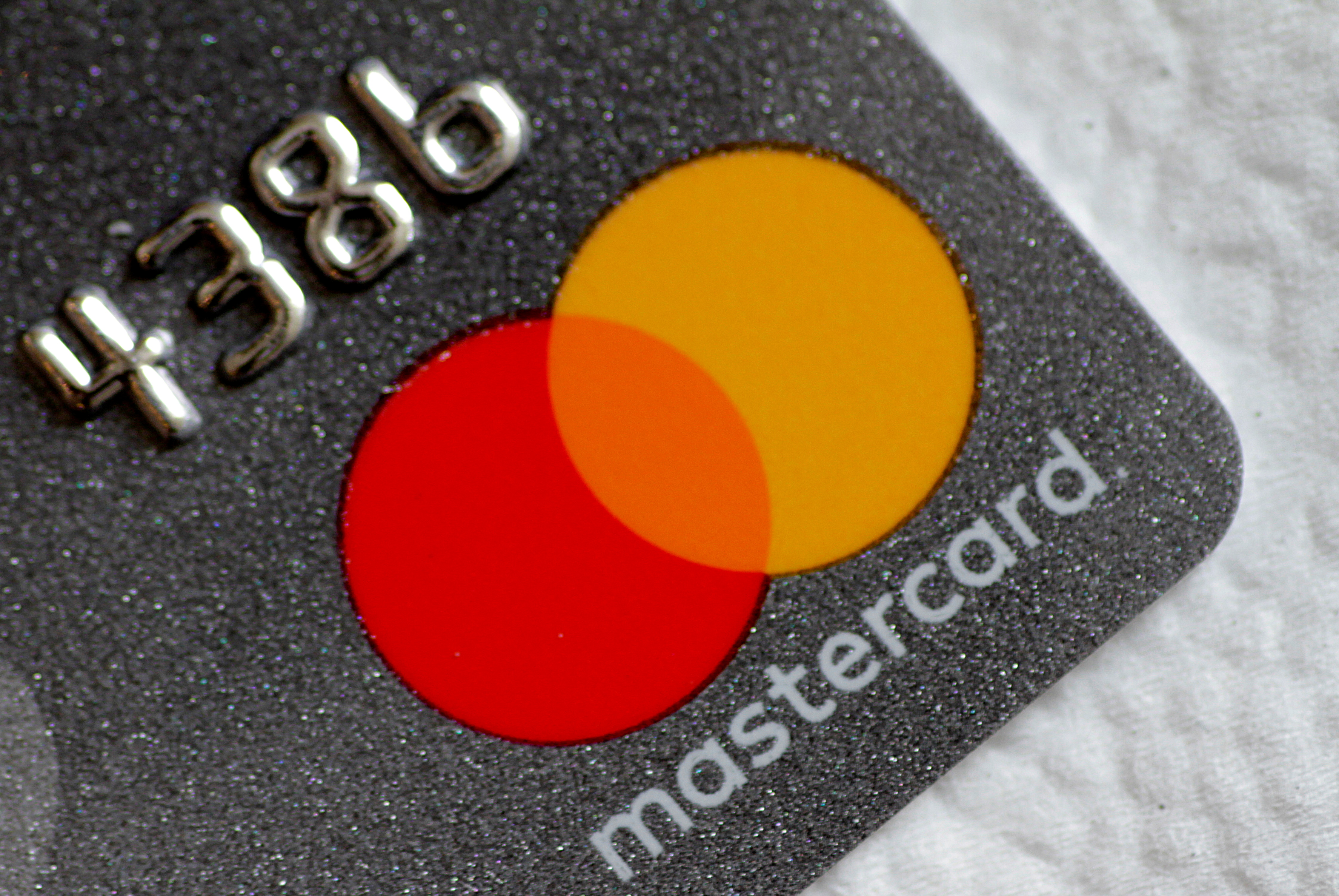 Illustration photo of a Mastercard logo on a credit card