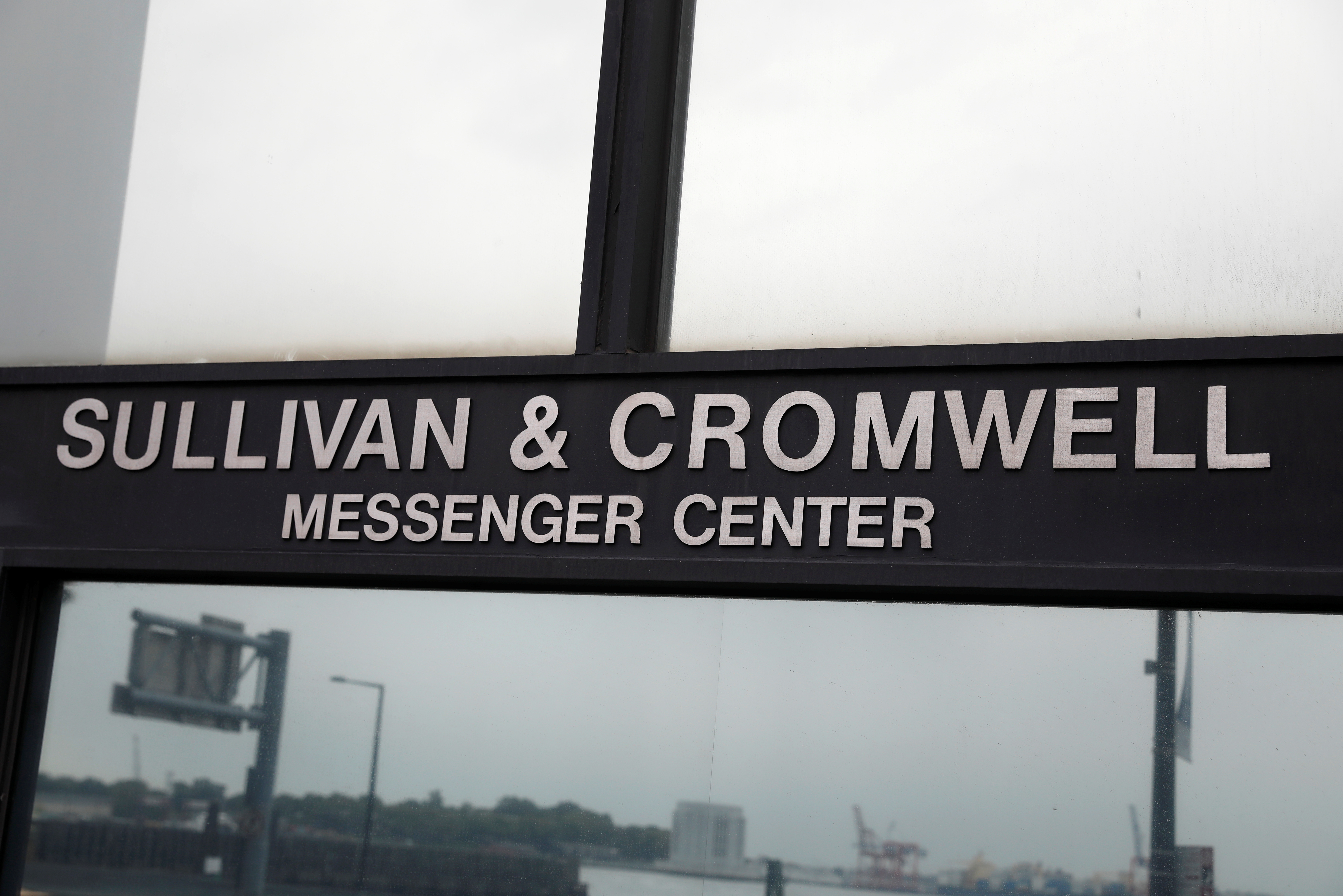 Signage is seen outside the law firm of Sullivan & Cromwell in Manhattan, New York