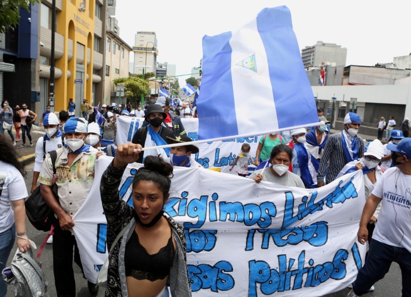 Nicaraguans exiled in Costa Rica take part in a march against the Government of Nicaraguan President Daniel Ortega and the upcoming November 7 general elections, in San Jose