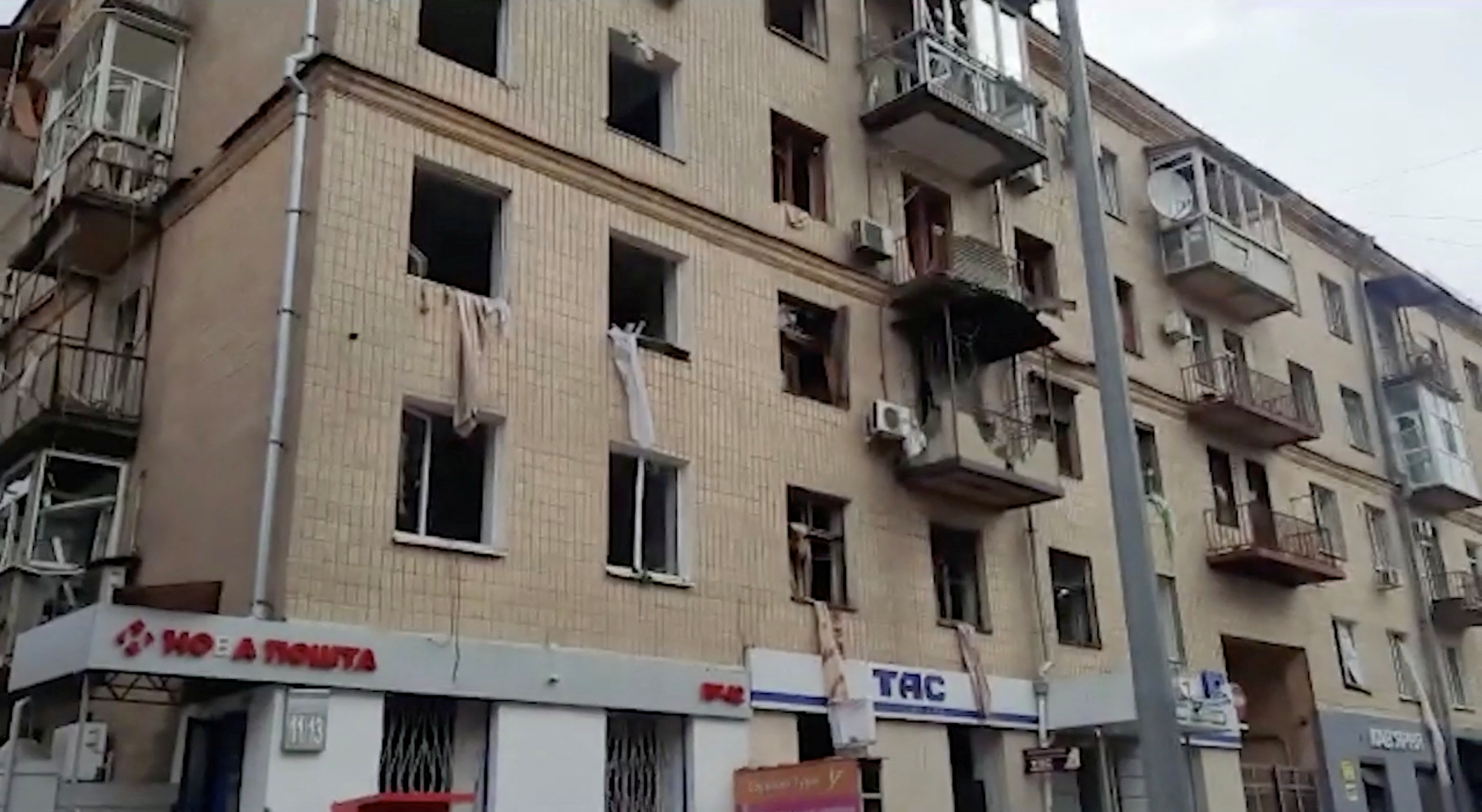 Kharkiv fire crews attend fire at damaged building in city