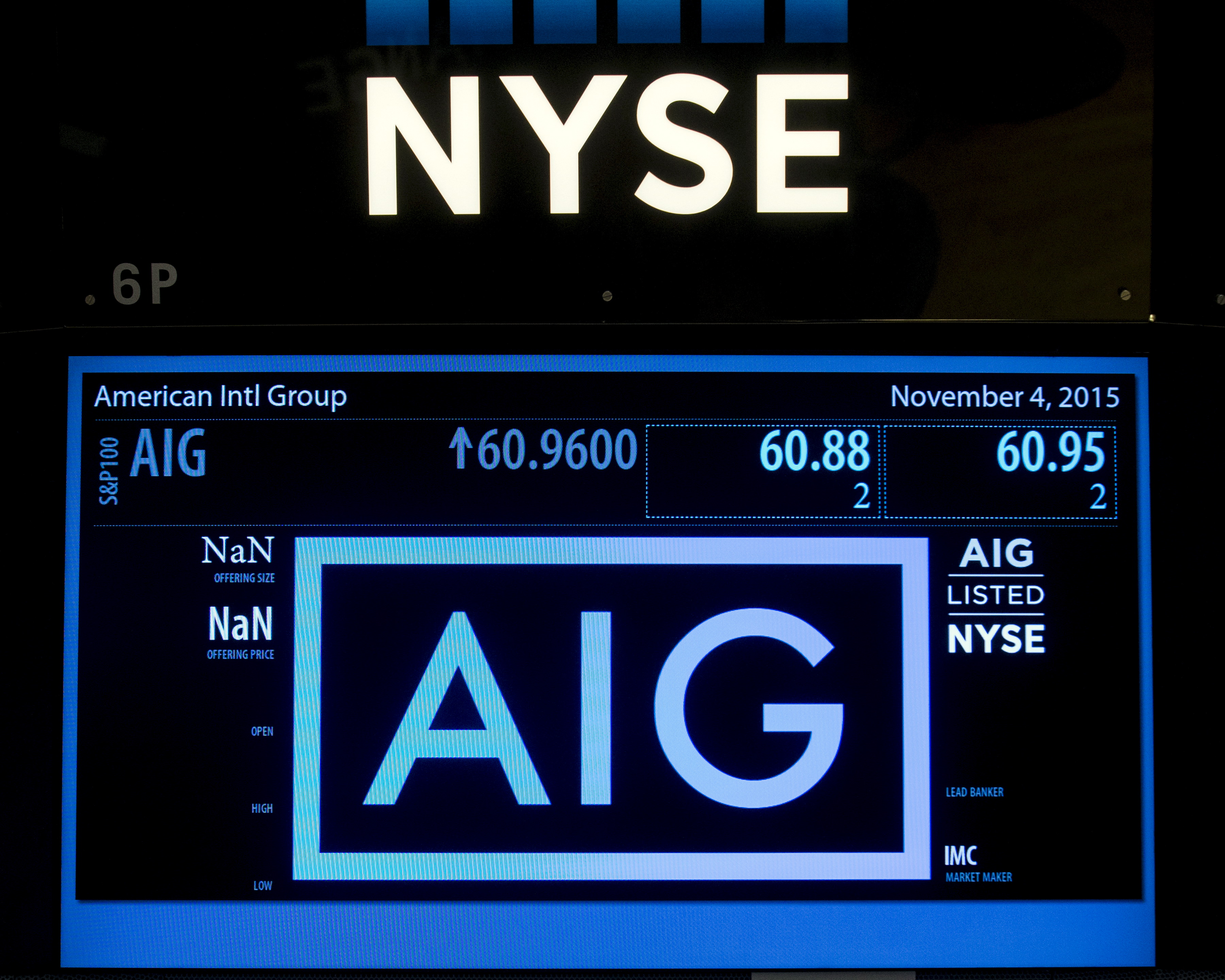 The ticker information for insurance company American International Group Inc., (AIG) is displayed on a screen above the post where it is traded on the floor of the New York Stock Exchange