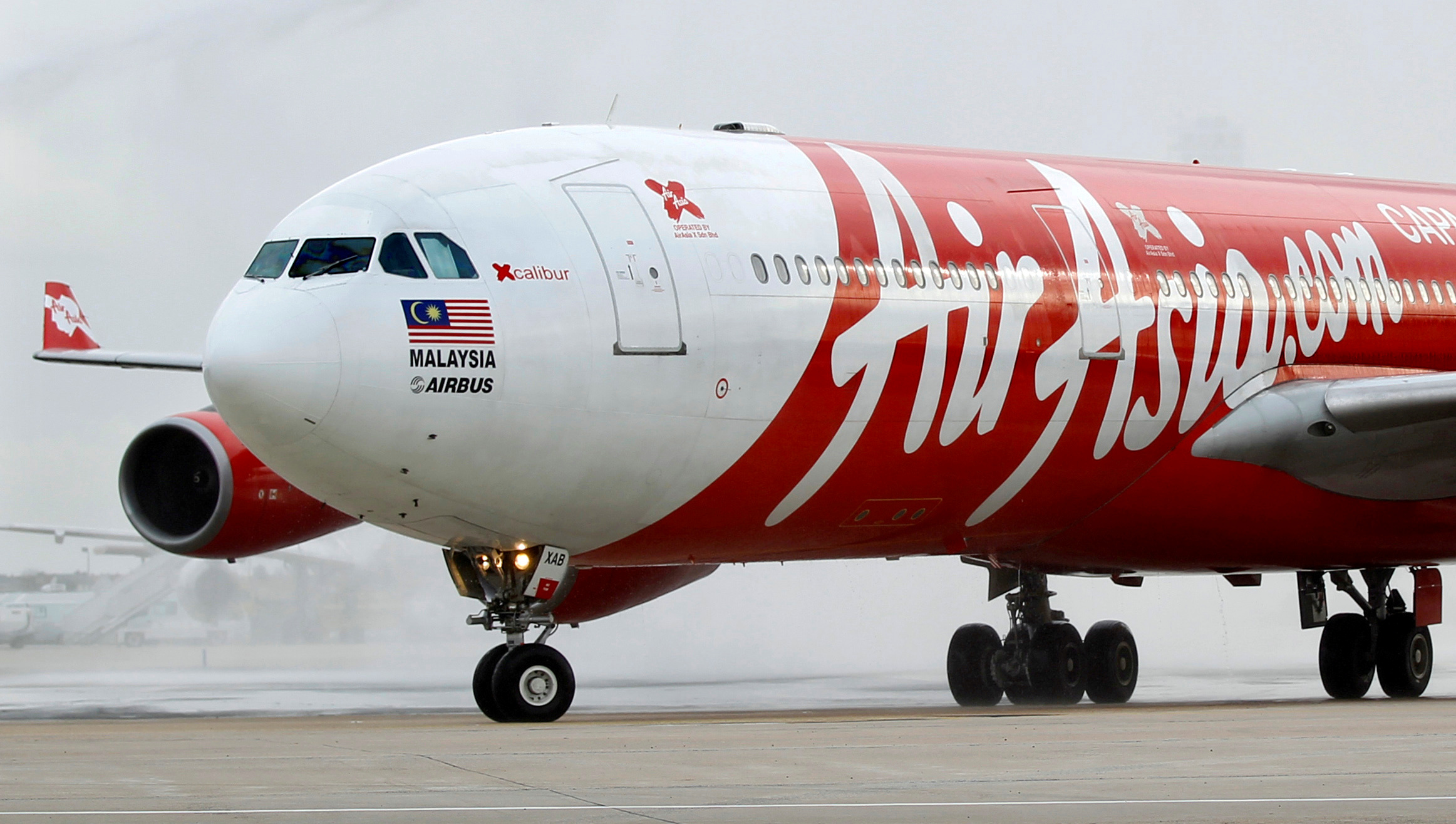 File photo of an AirAsia X Airbus passenger jet arriving at Orly airport near Paris