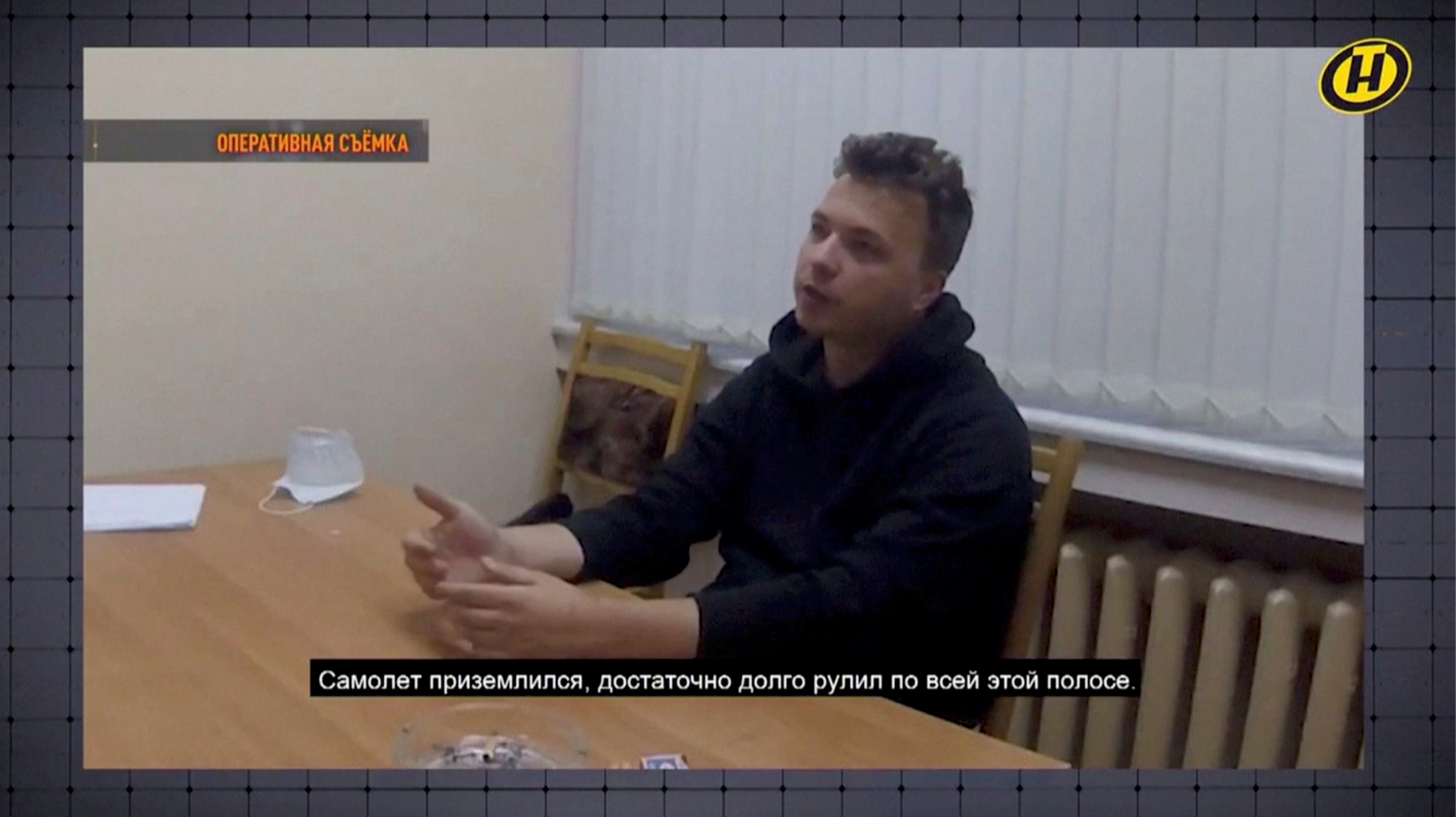 Belarusian dissident journalist Roman Protasevich speaks during questioning in an unknown location