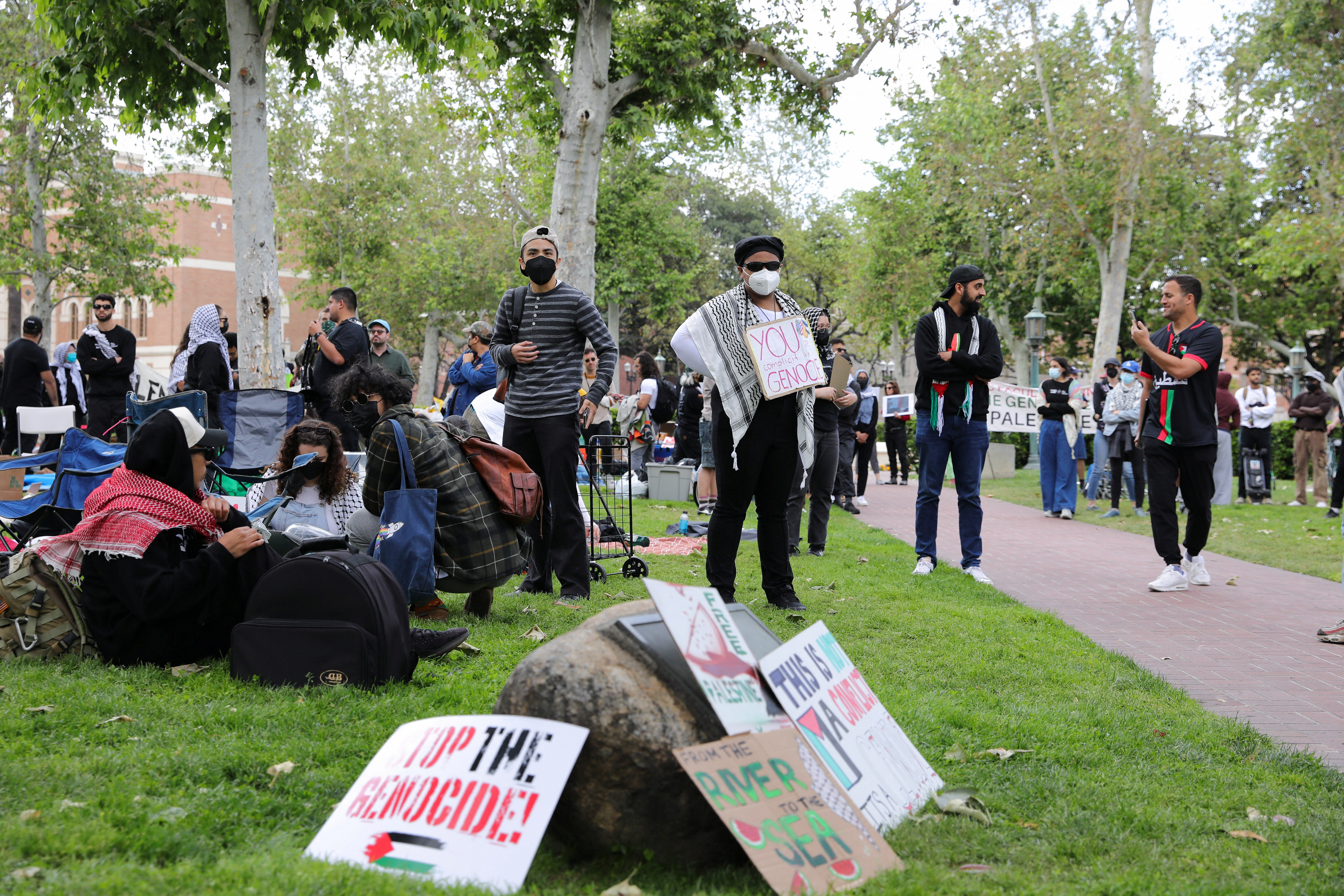 Students build a protest encampment in support of Palestinians, at USC in Los Angeles