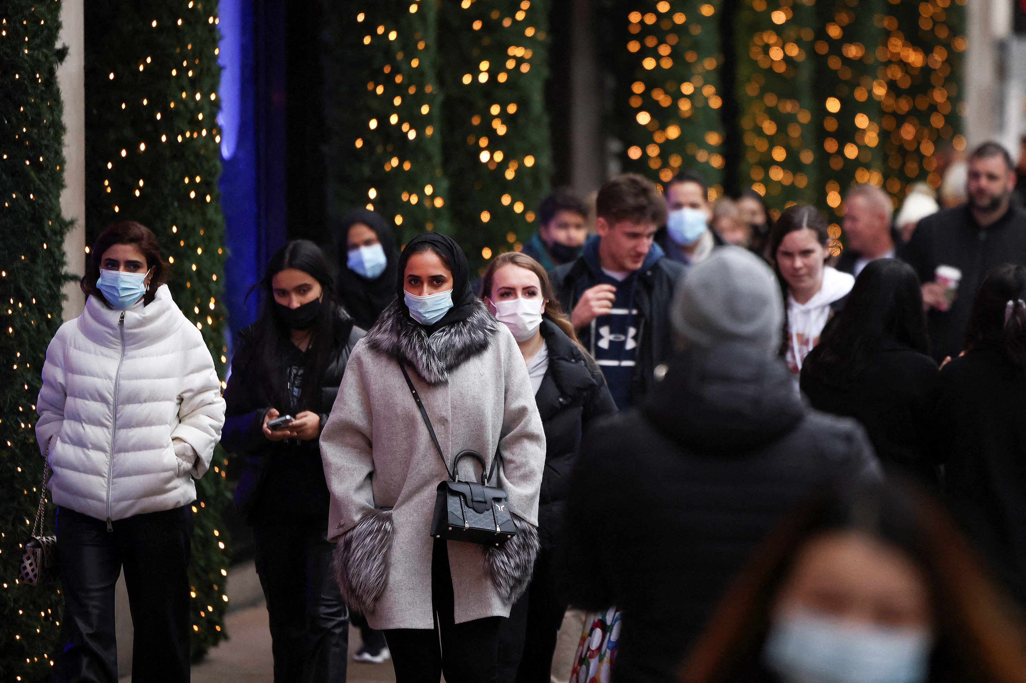 Shoppers walk along Oxford Street, amid the coronavirus disease (COVID-19) outbreak in London