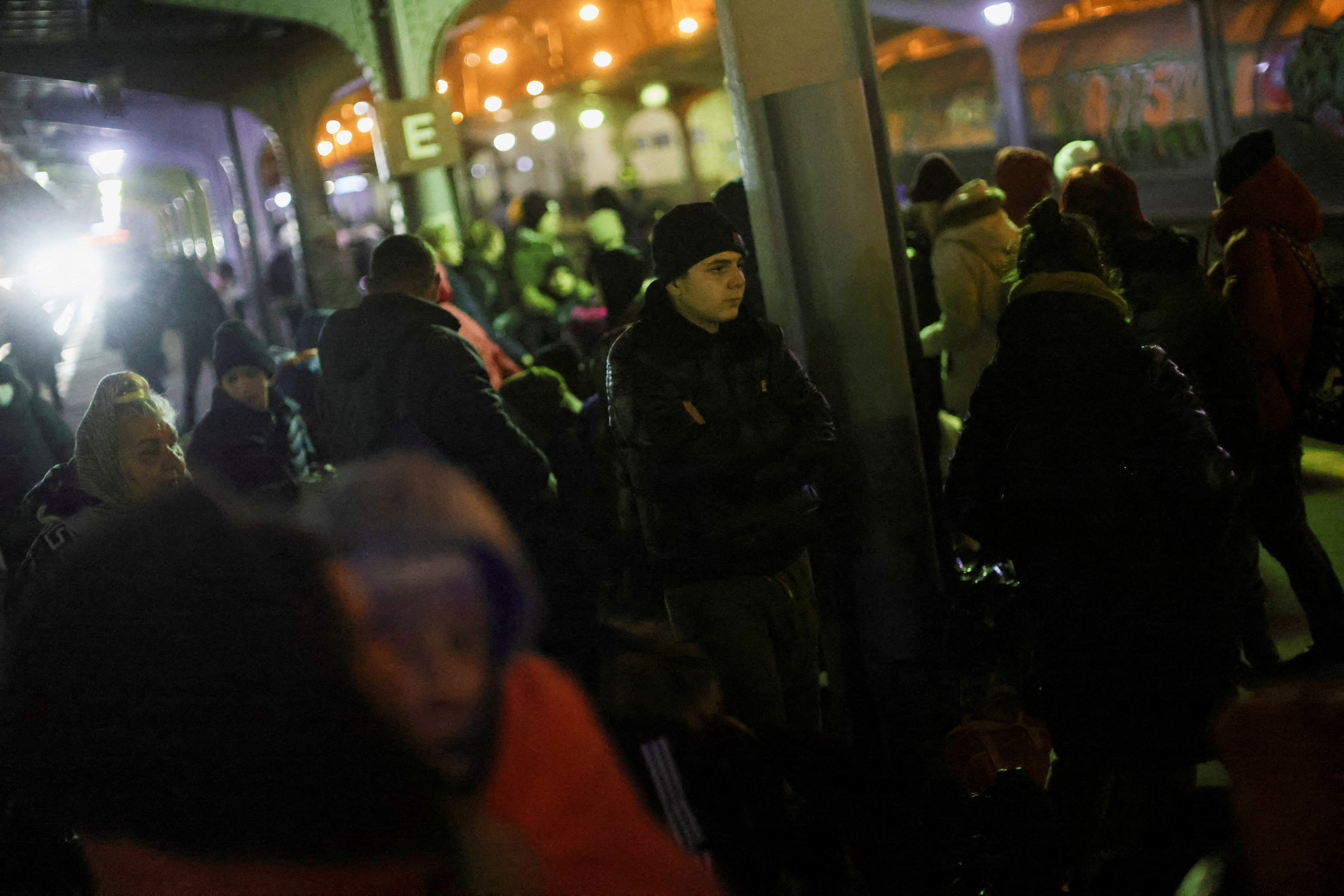 Refugees fleeing Ukraine after Russian invasion travel on train to Budapest
