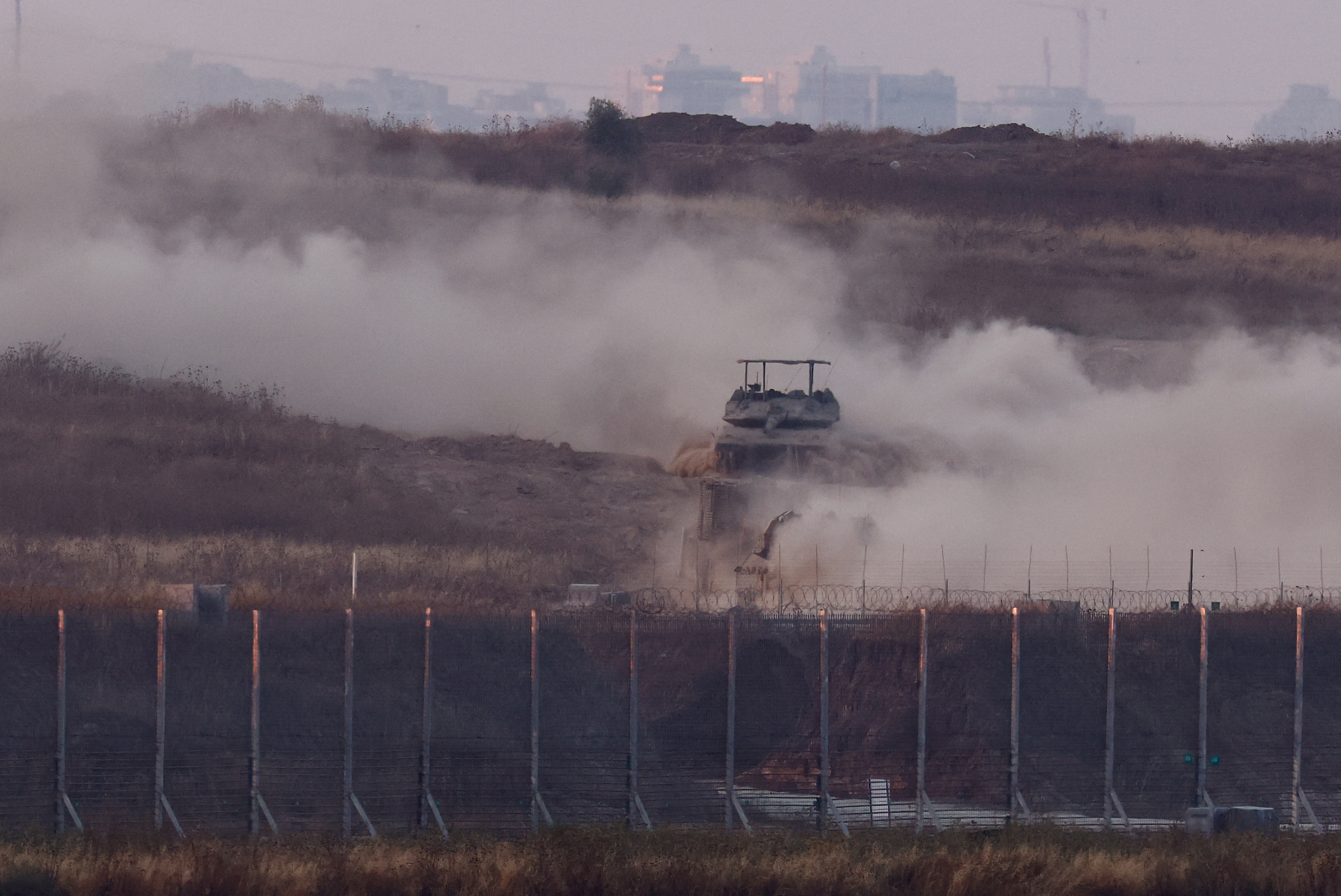 An Israeli tank manoeuvres inside Gaza