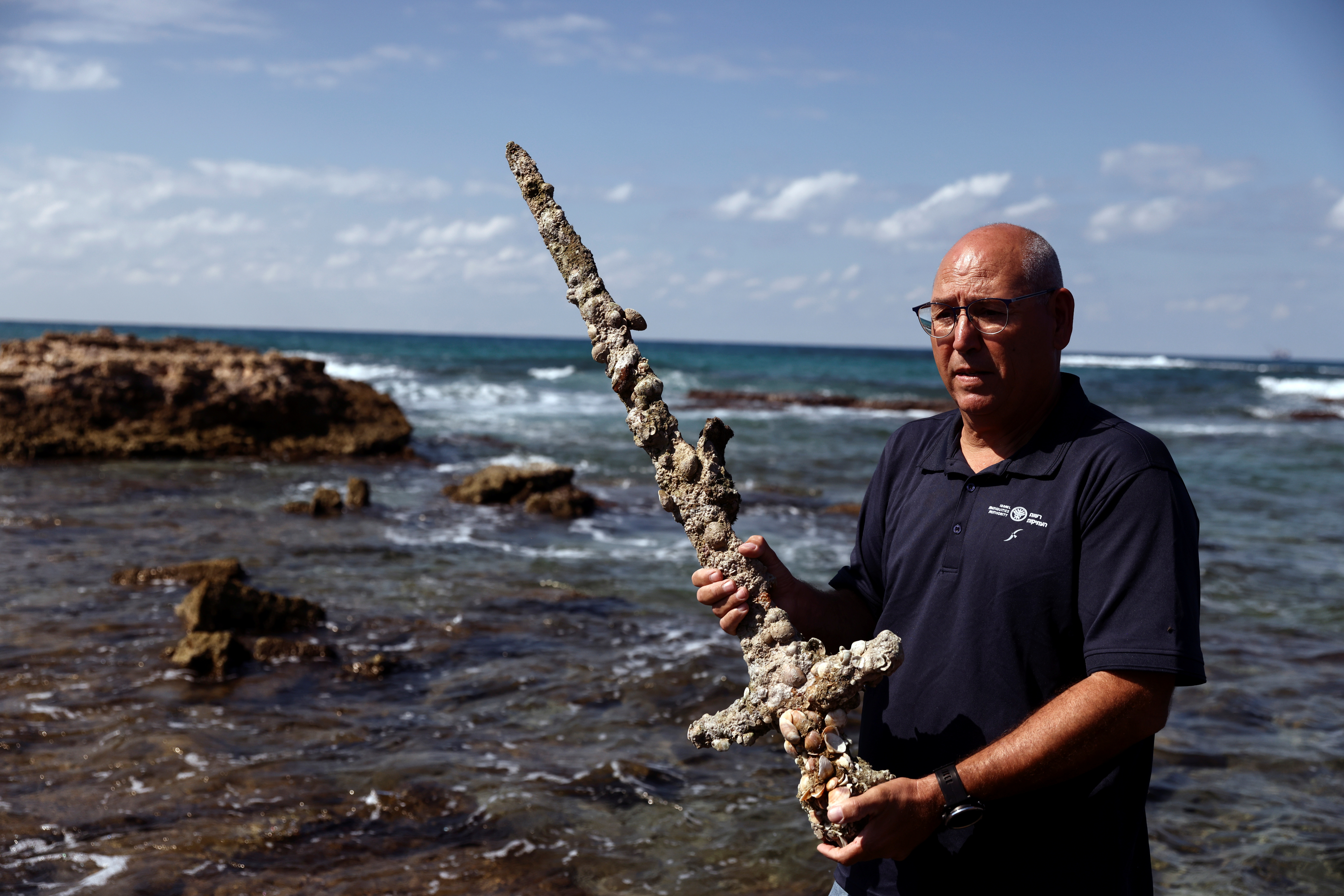A sword believed to have belonged to a Crusader who sailed to the Holy Land almost a millennium ago was found in Caesarea