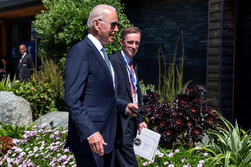 U.S. President Joe Biden walks with National Security Advisor Jake Sullivan as he arrives for the final session of the G7 summit in Carbis Bay, Cornwall, Britain, June 13, 2021. Doug Mills/Pool via REUTERS