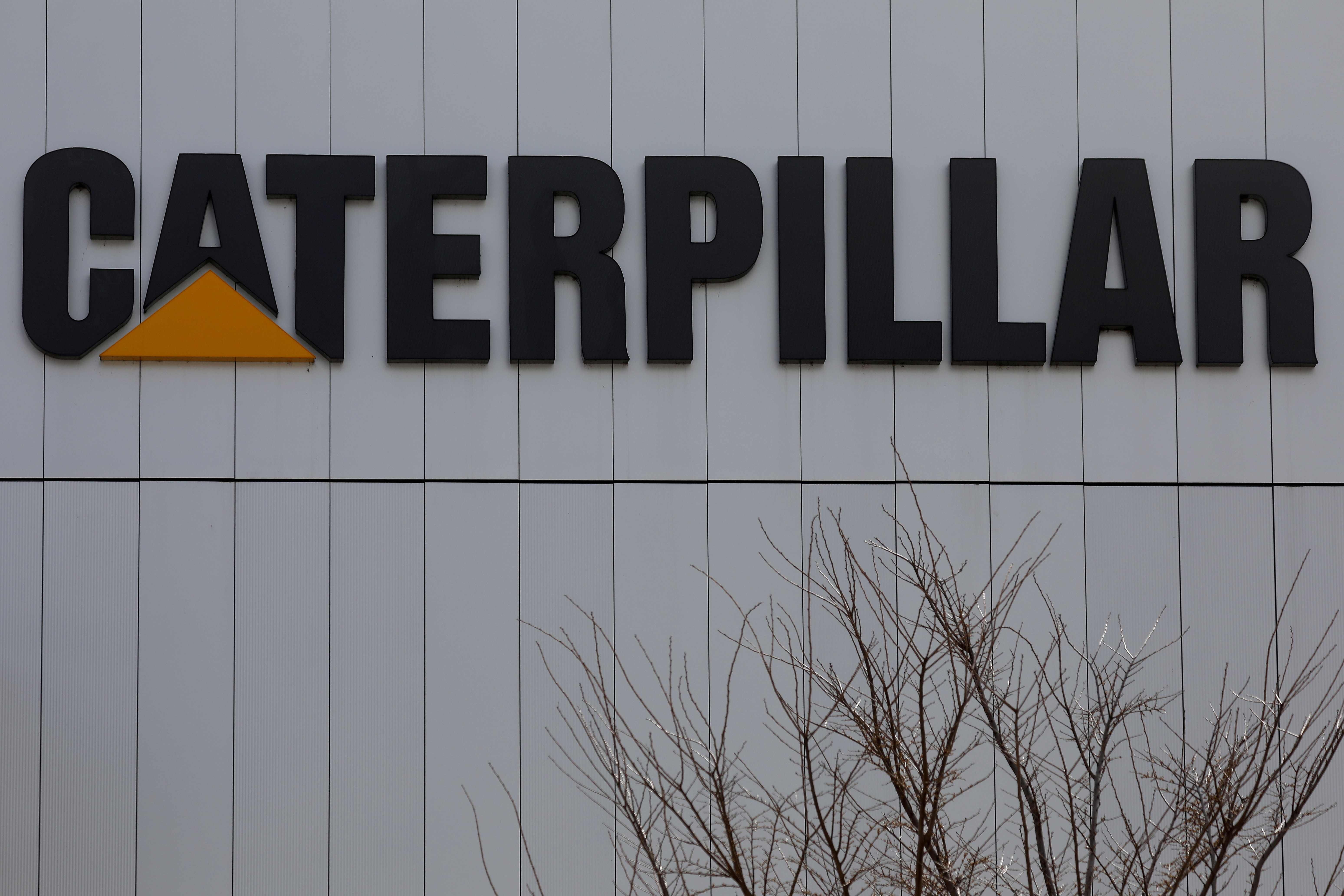 A Caterpillar corporate logo is pictured on a building in Peoria