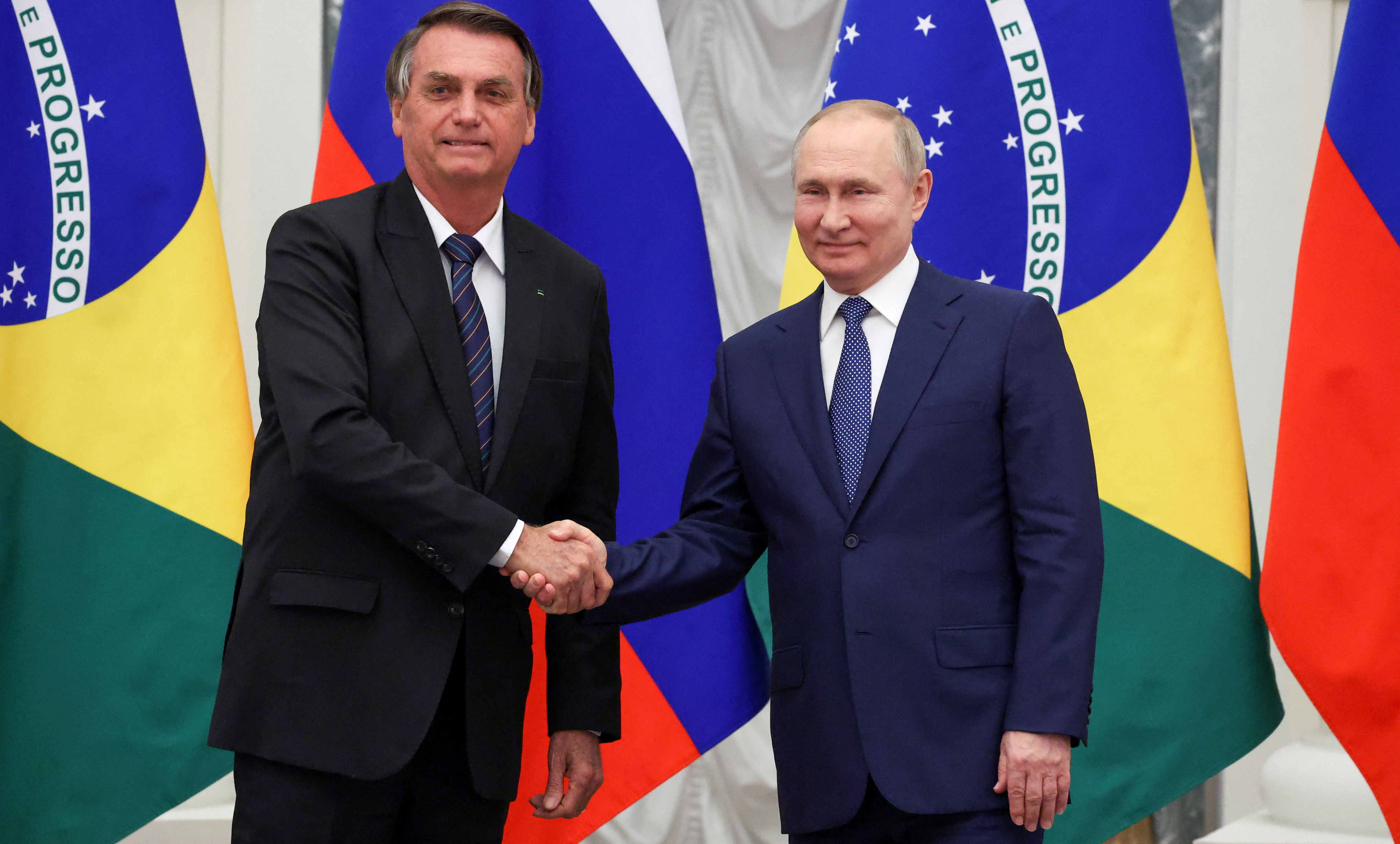 Russian President Putin and his Brazilian counterpart Bolsonaro attend a news conference in Moscow
