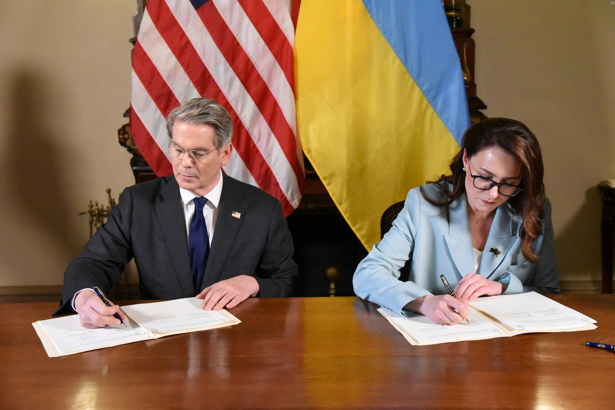 Ukraine, US sign minerals deal sought by Trump | Reuters