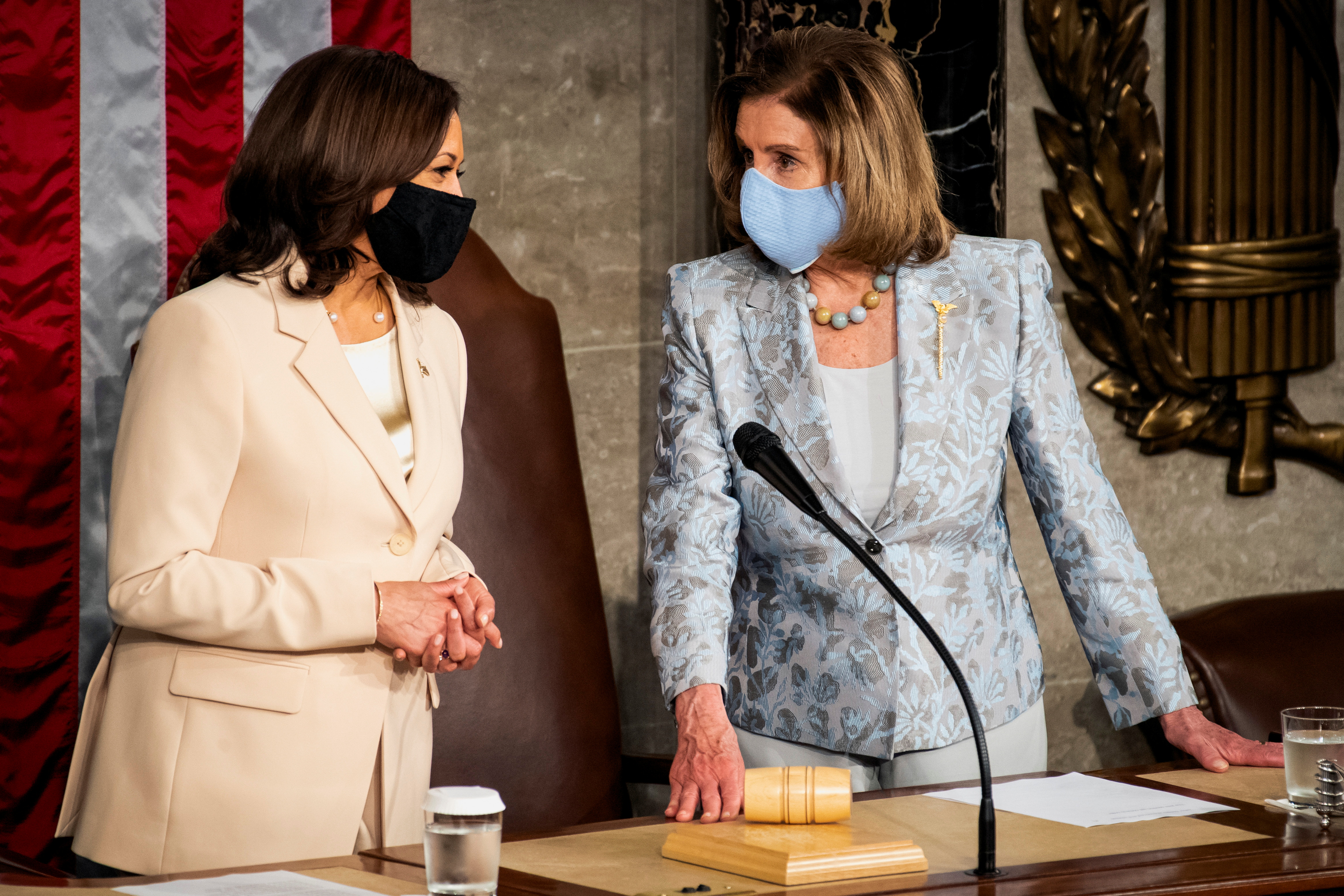 U.S. Vice President Kamala Harris and Speaker of the House Nancy Pelosi talk before the start of President Joe Biden's address to the joint session of Congress at the U.S. Capitol in Washington
