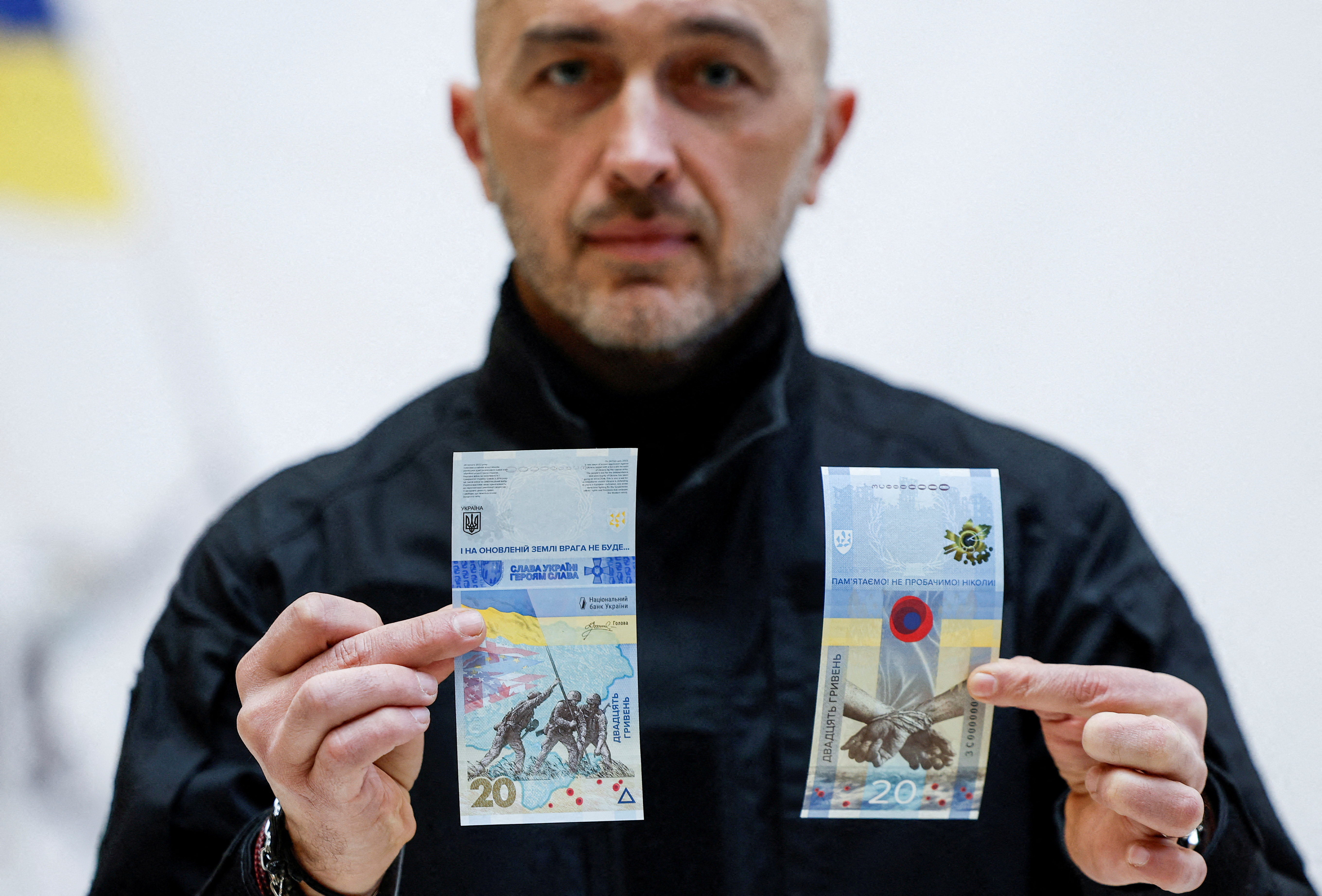 Banknotes dedicated the to first anniversary of Russia's invasion on Ukraine are presented in Kyiv