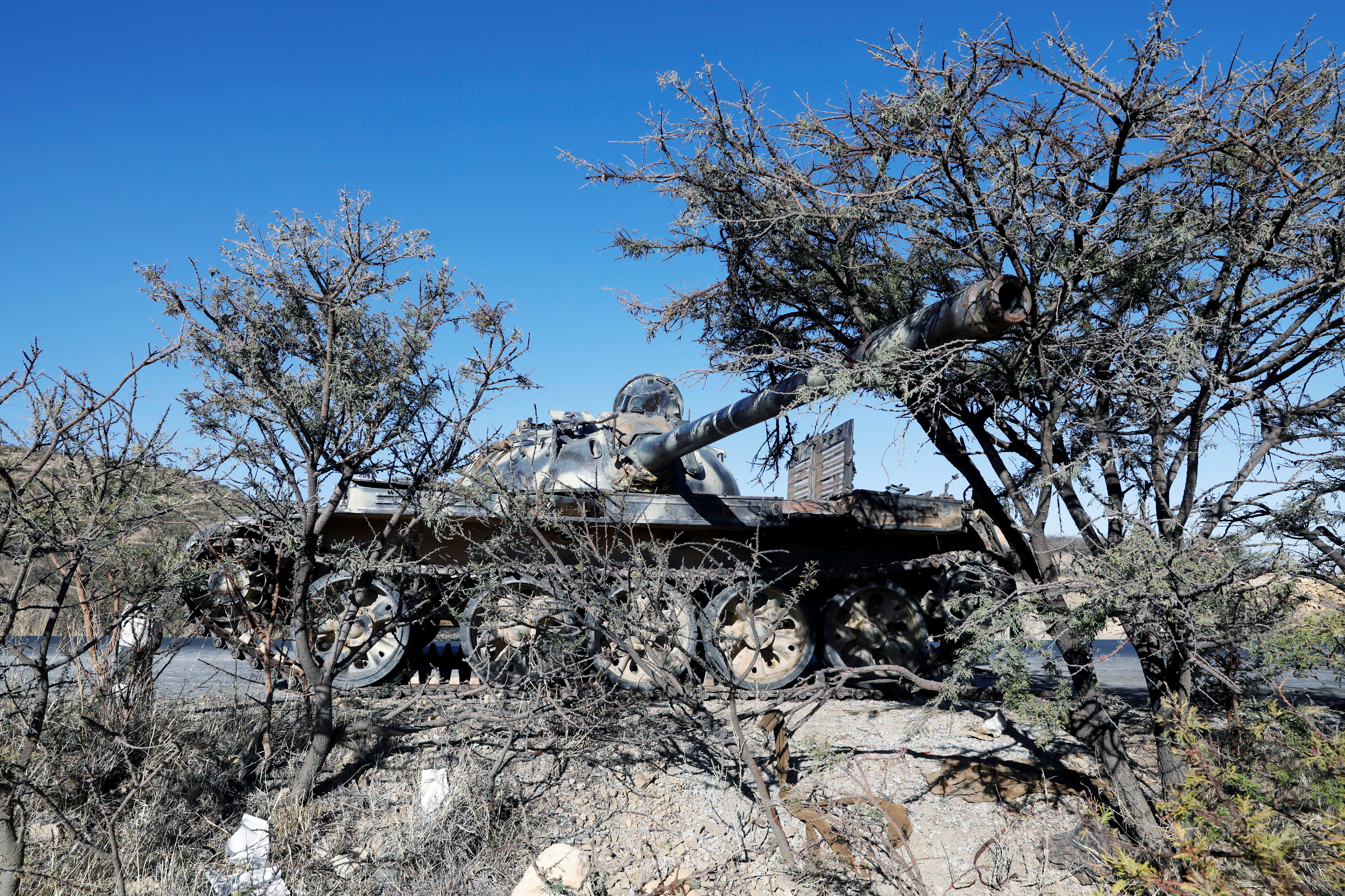 A damaged Eritrean military tank is seen near the town of Wikro