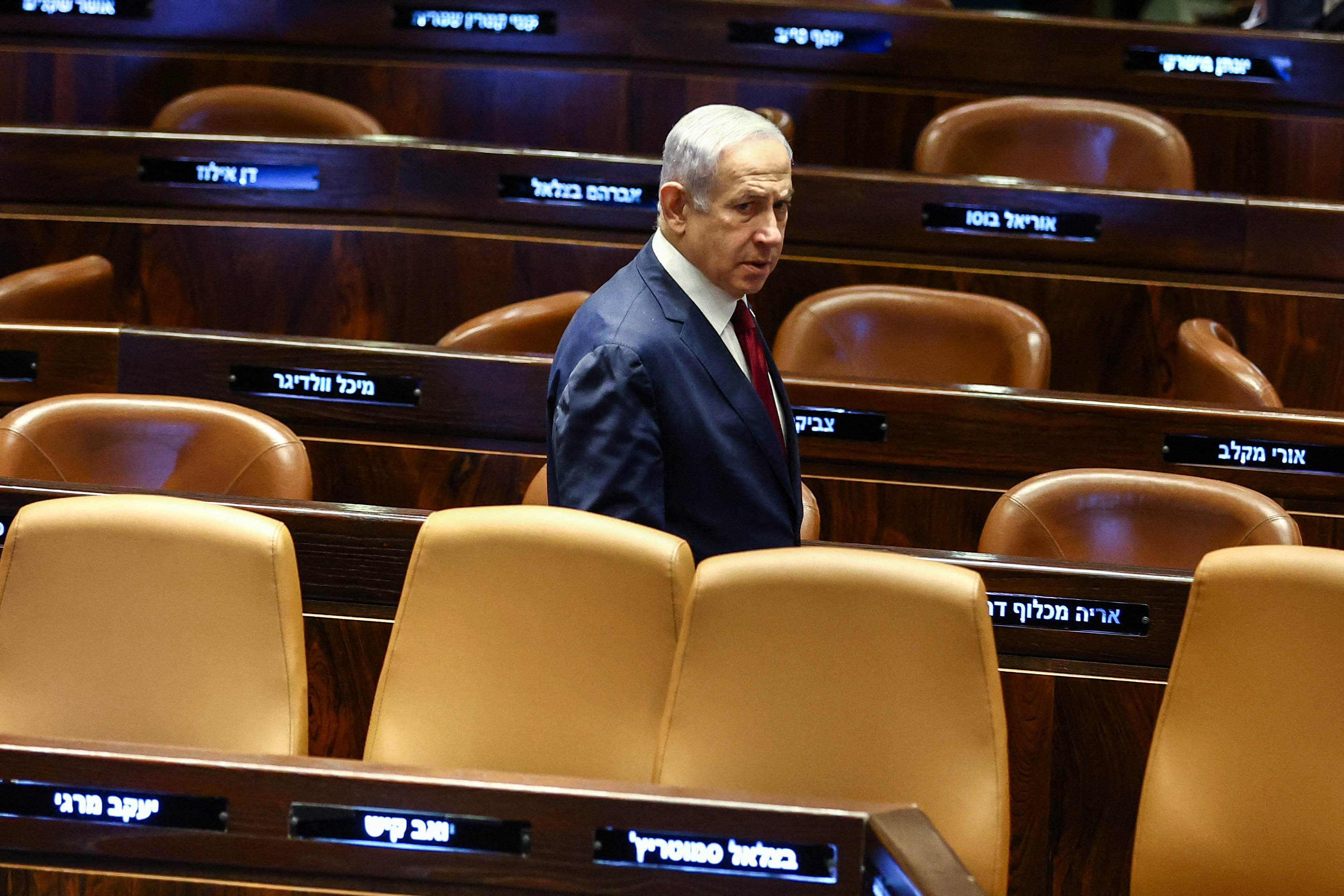 Israeli Prime Minister Benjamin Netanyahu looks on as Israel's parliament is scheduled to elect its two members to the committee that appoints judges, at the plenum of the Knesset, Israel's parliament, in Jerusalem