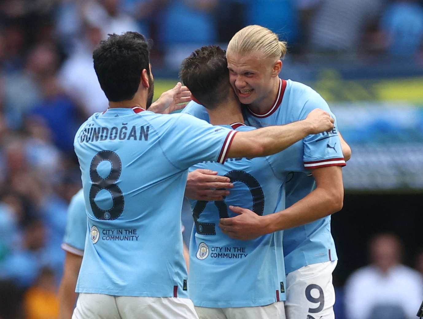 Manchester City's Erling Haaland holds the winners trophy as he celebrates  winning the English FA Cup final soccer match between Manchester City and  Manchester United at Wembley Stadium in London, Saturday, June