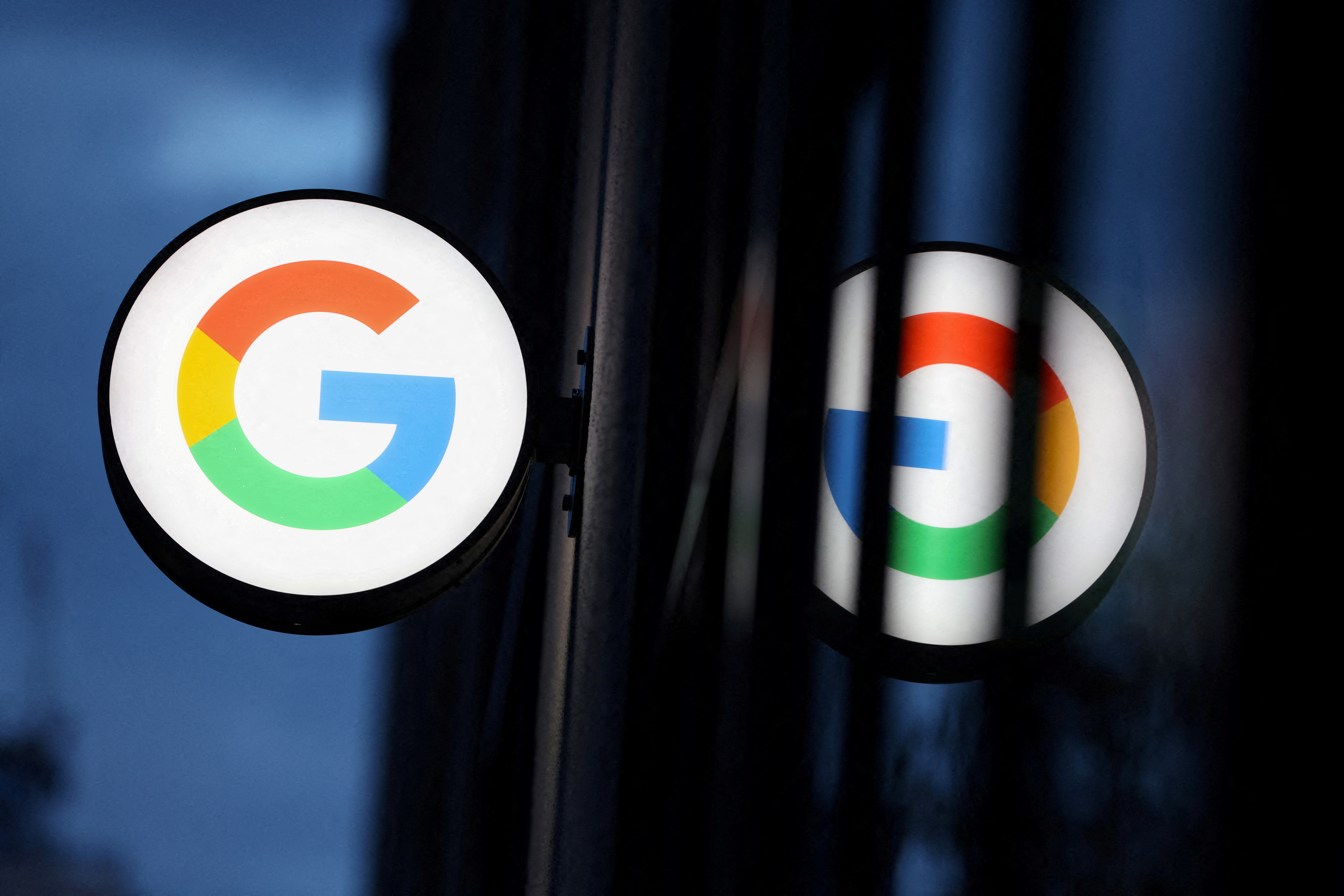 The logo for Google LLC is seen at the Google Store Chelsea in Manhattan, New York City, U.S., November 17, 2021. REUTERS/Andrew Kelly/File Photo  