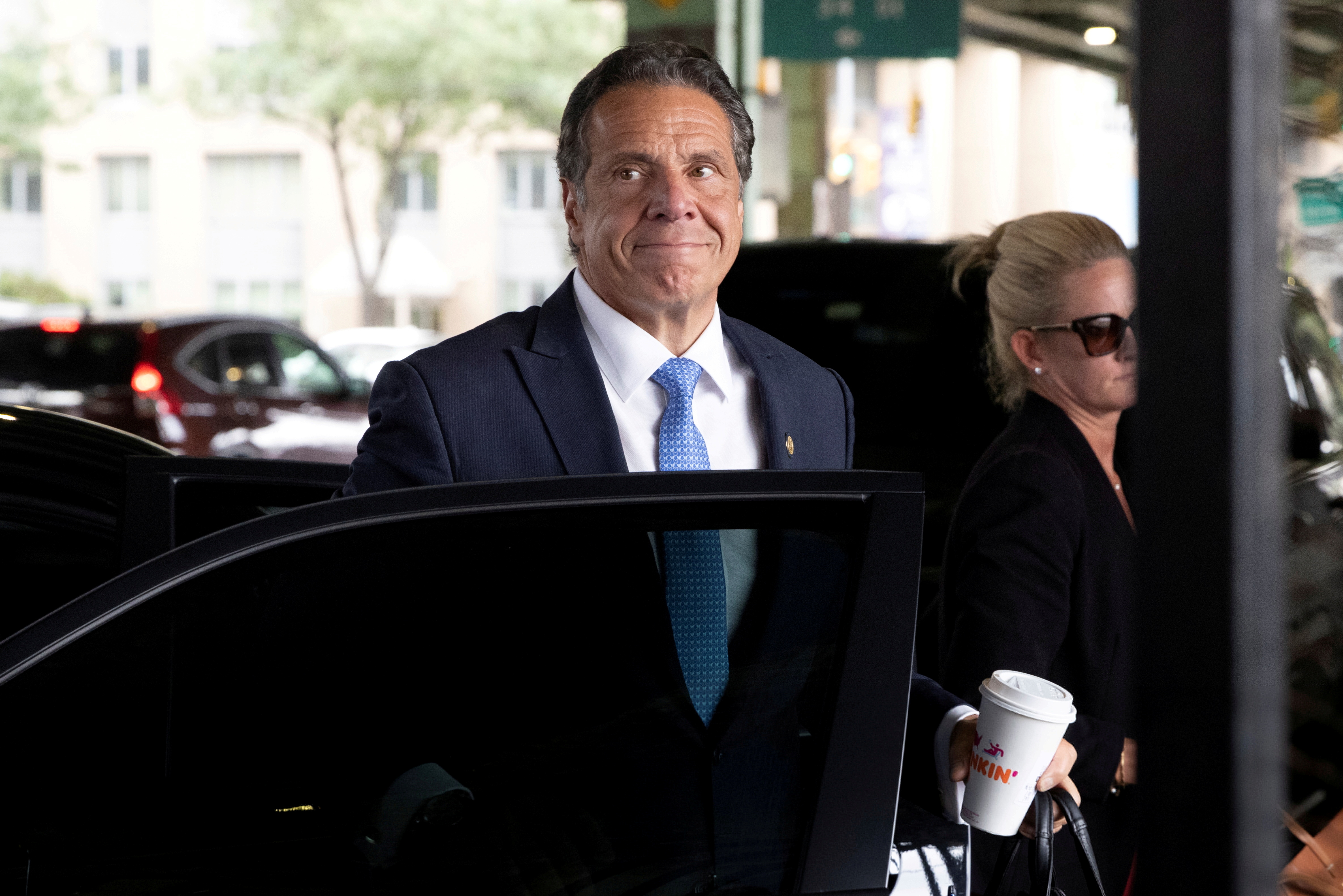 New York Governor Andrew Cuomo arrives to depart in his helicopter after announcing his resignation in Manhattan, New York City, U.S., August 10, 2021. REUTERS/Caitlin Ochs/File Photo