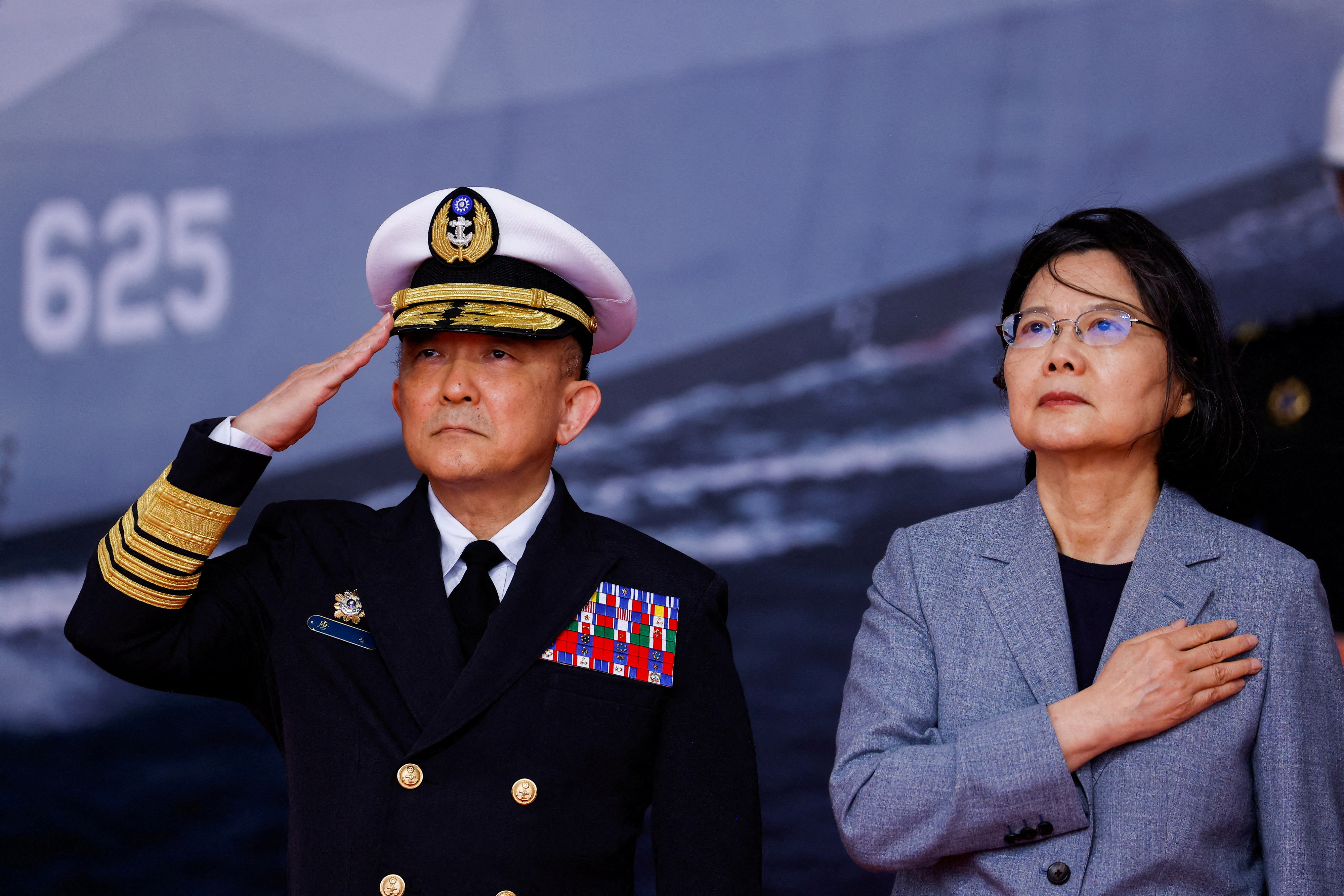 Taiwan President Tsai Ing-wen and Taiwan Navy Commander Tang Hua attend the delivery ceremony of six made-in-Taiwan Tuo Chiang-class corvettes at a port in Yilan