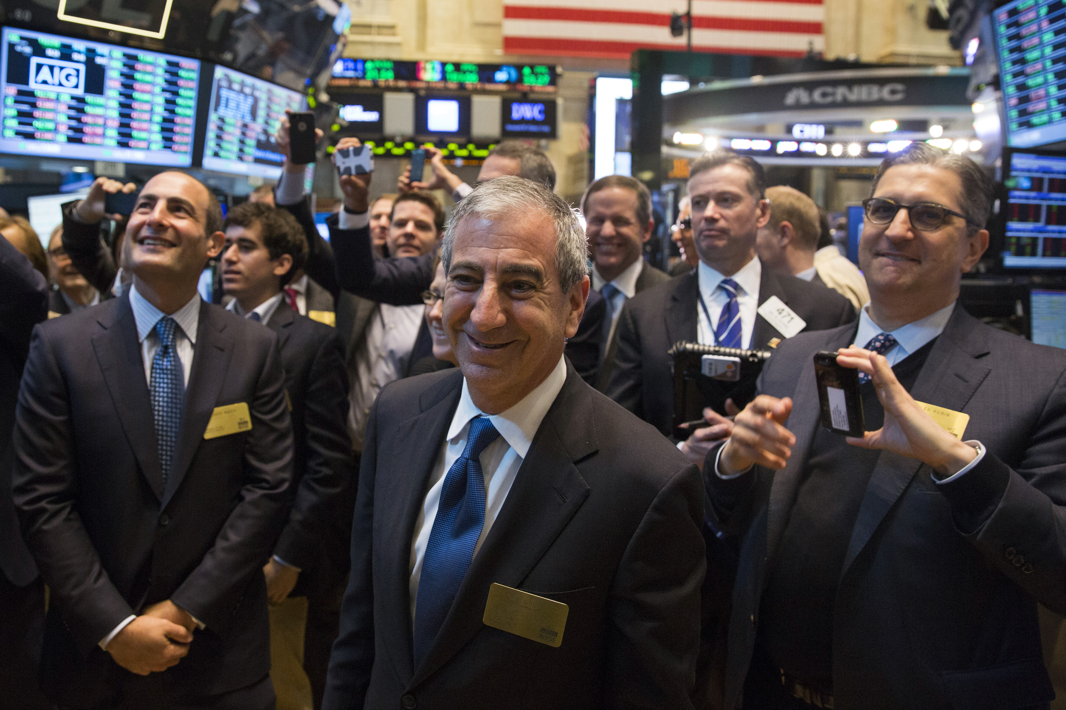 Chief executive officer of Moelis & Co., Ken Moelis smiles after ringing the bell to mark the company's IPO on the floor of the New York Stock Exchange shortly after the opening bell in New York