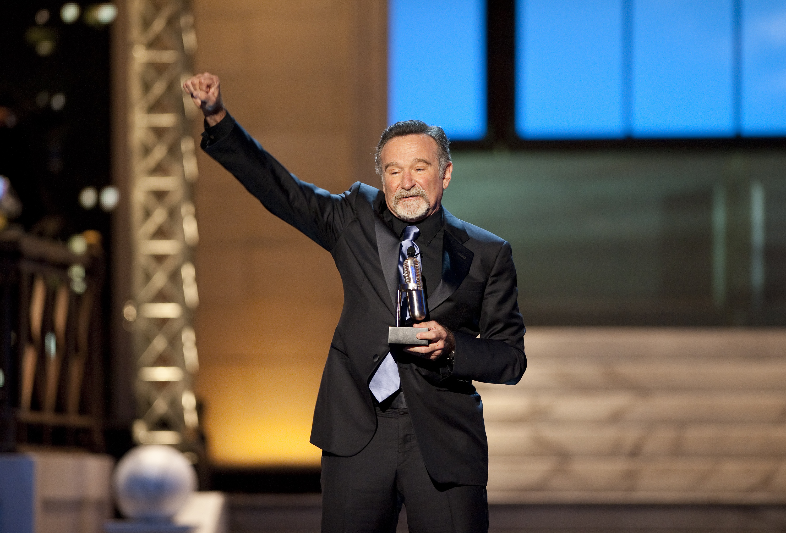 Comedian Robin Williams reacts after receiving the Stand Up Icon Award during the second annual 2012 Comedy Awards in New York
