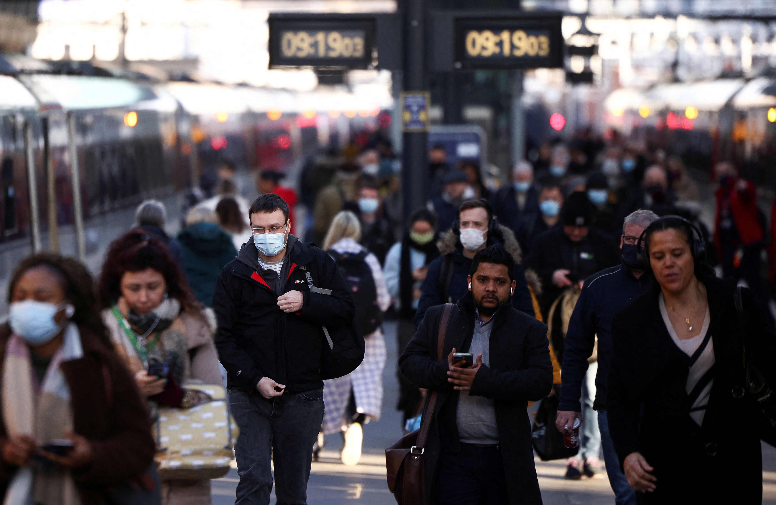 People walk at King's Cross train station, amid the ongoing coronavirus disease (COVID-19) pandemic, in London
