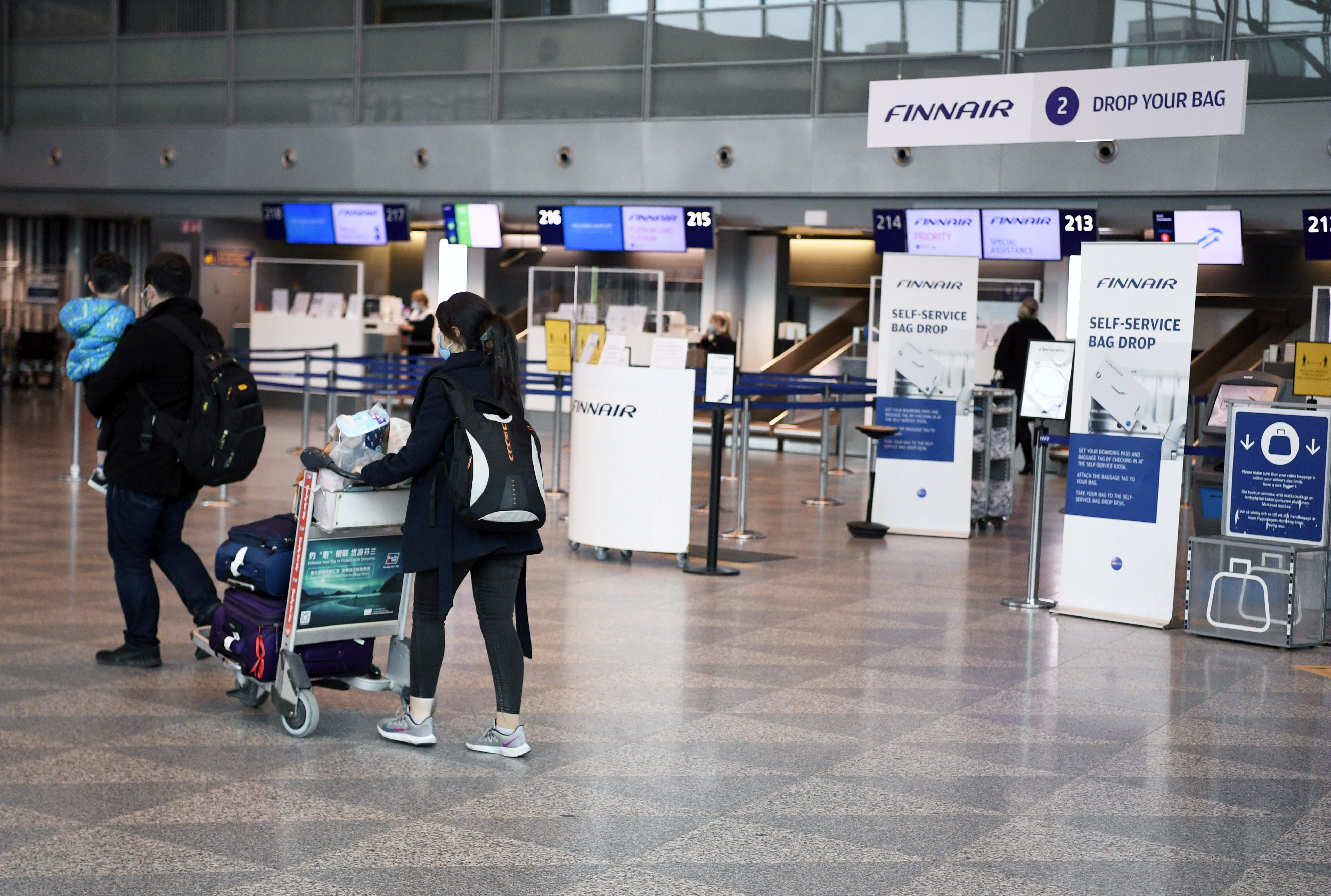 Tourists at the Helsinki-Vantaa airport in Vantaa