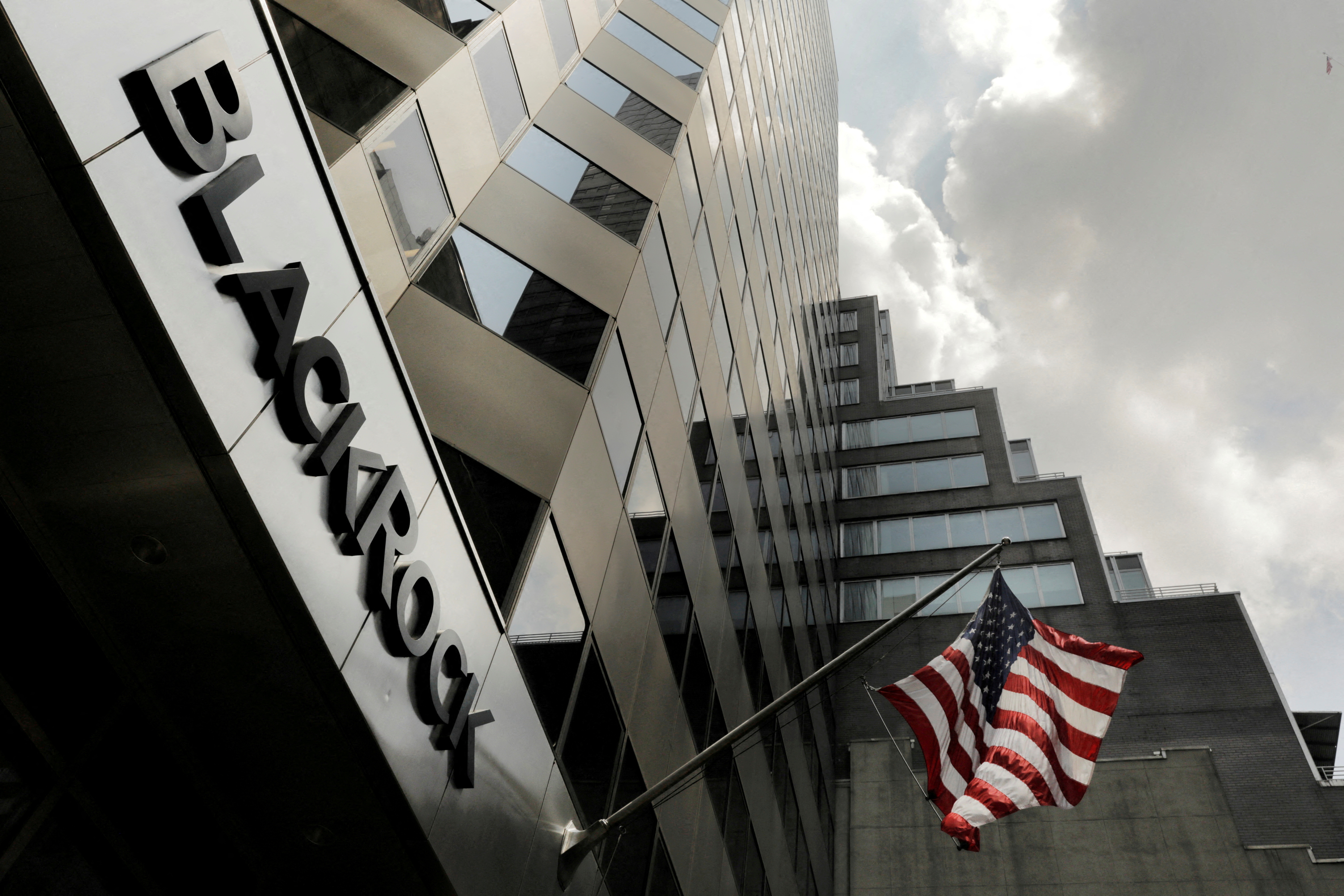 A sign for BlackRock Inc hangs above the company's building in New York
