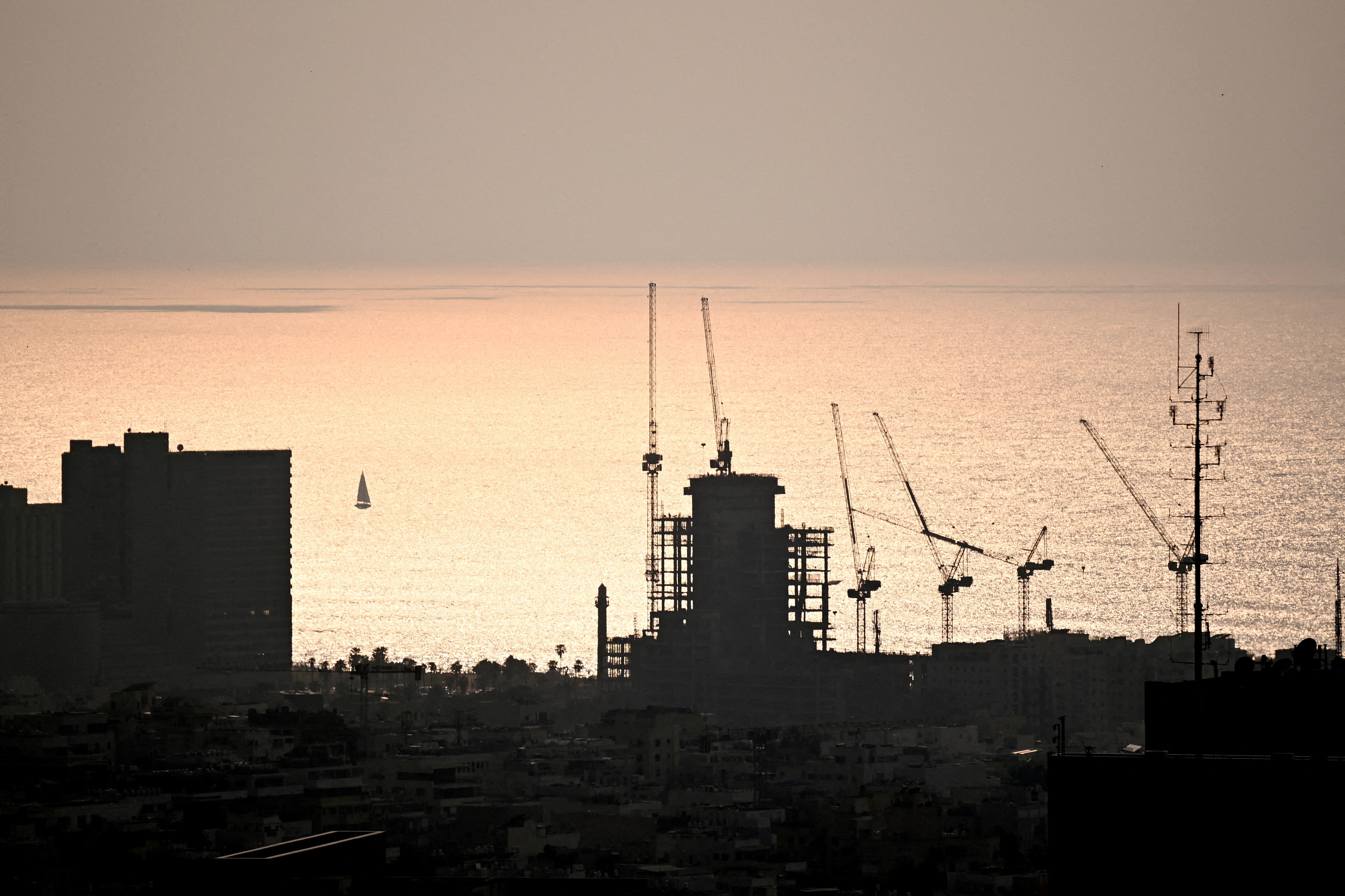 Construction work during the sunset in Tel Aviv