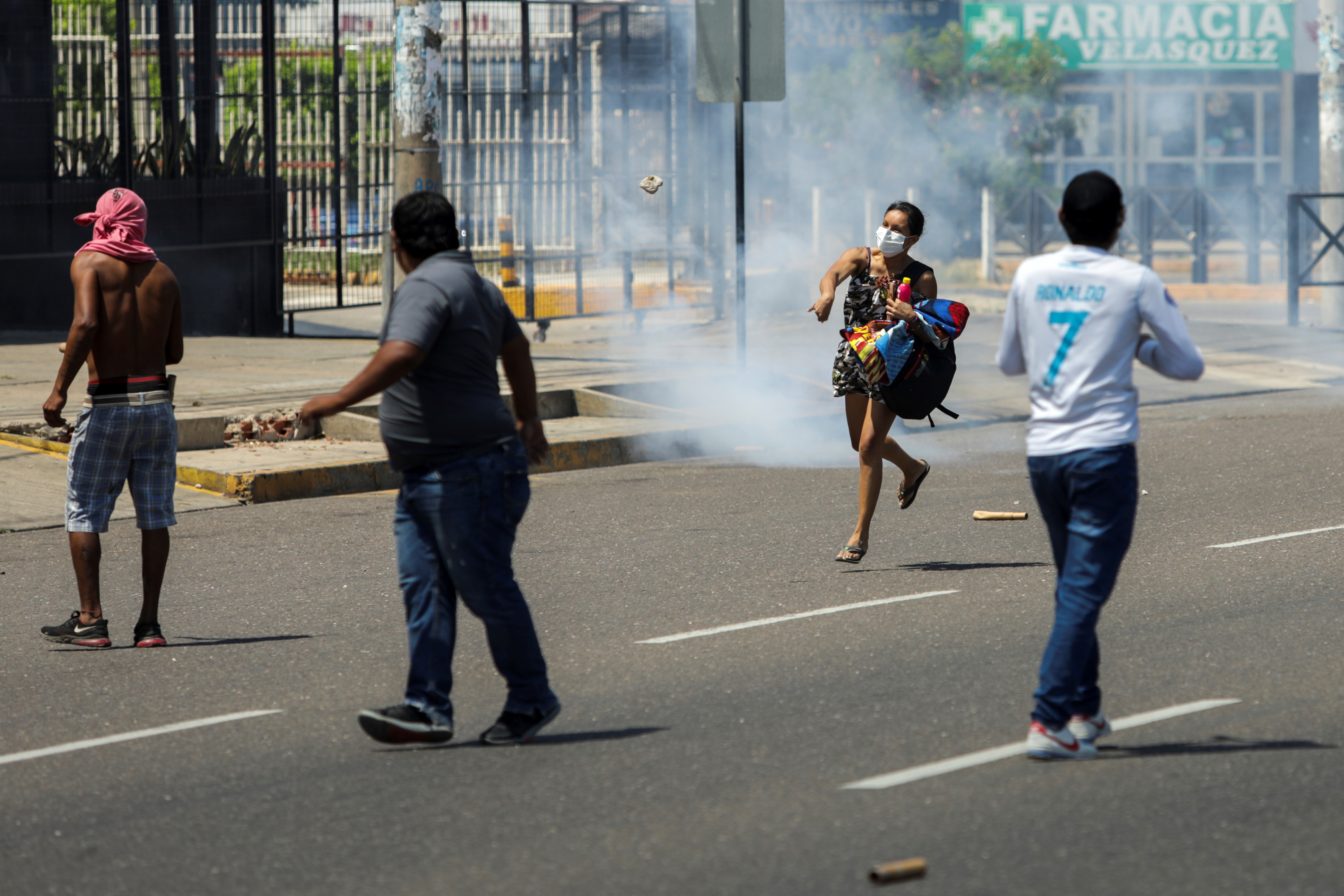 Supporters of Bolivian President Luis Arce and anti-government protestors clash, in Santa Cruz