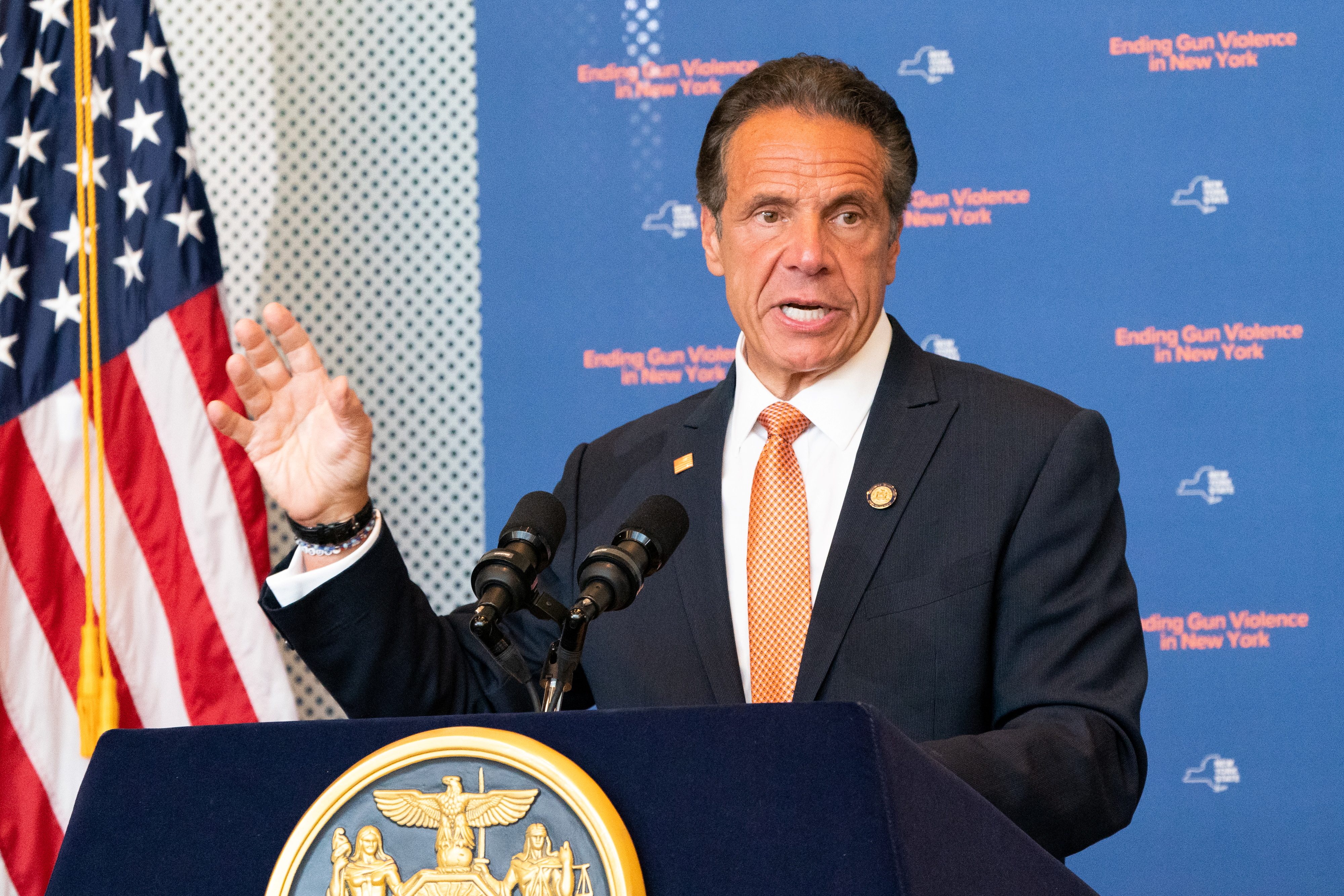New York Governor Andrew Cuomo signs the bill after making an announcement that Gun Manufacturers are Liable for the harm their products cause, in New York City
