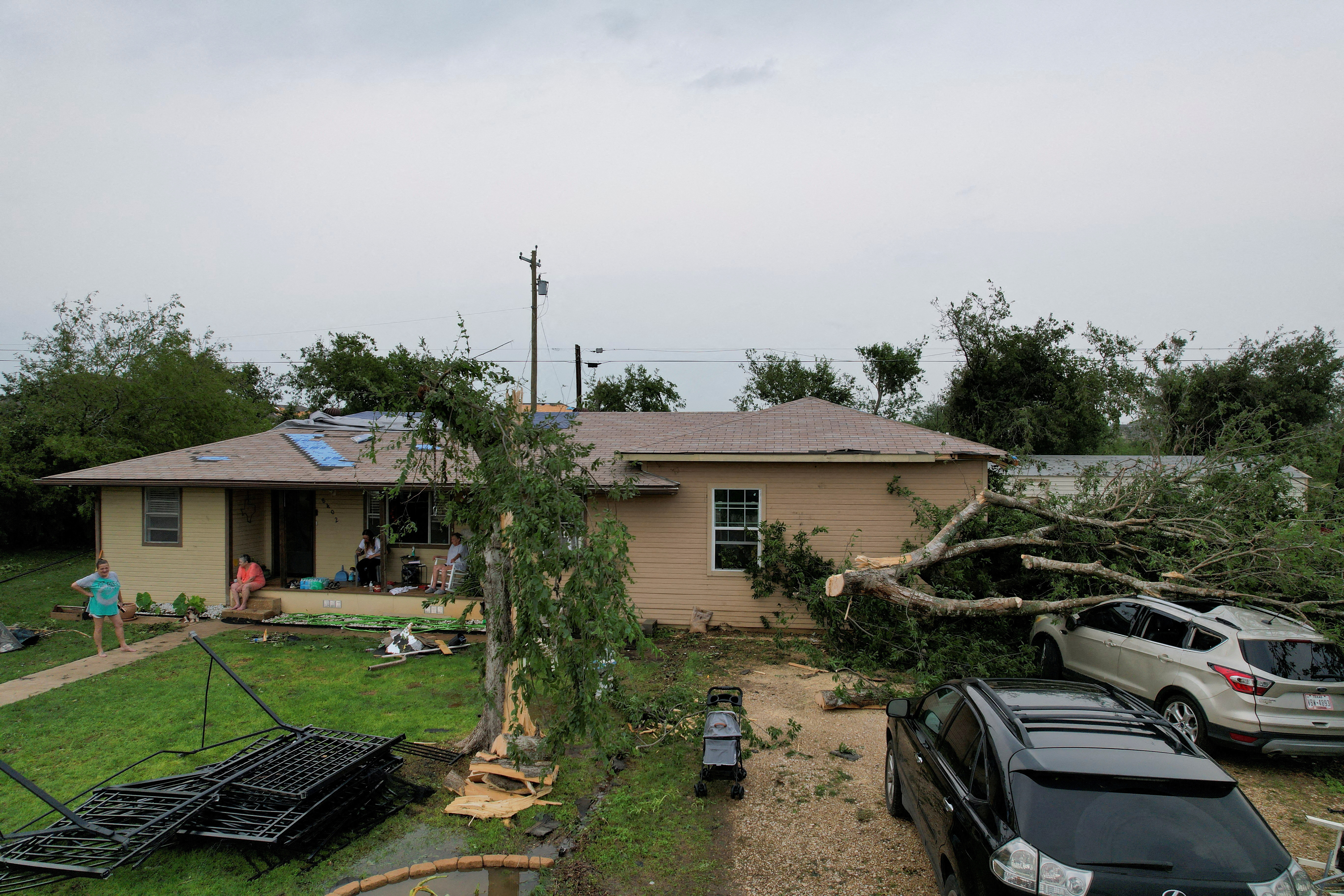 A view of the damage sustained by 55-year-old Cindi Watts' home, after a tornado ripped through the city, in Temple