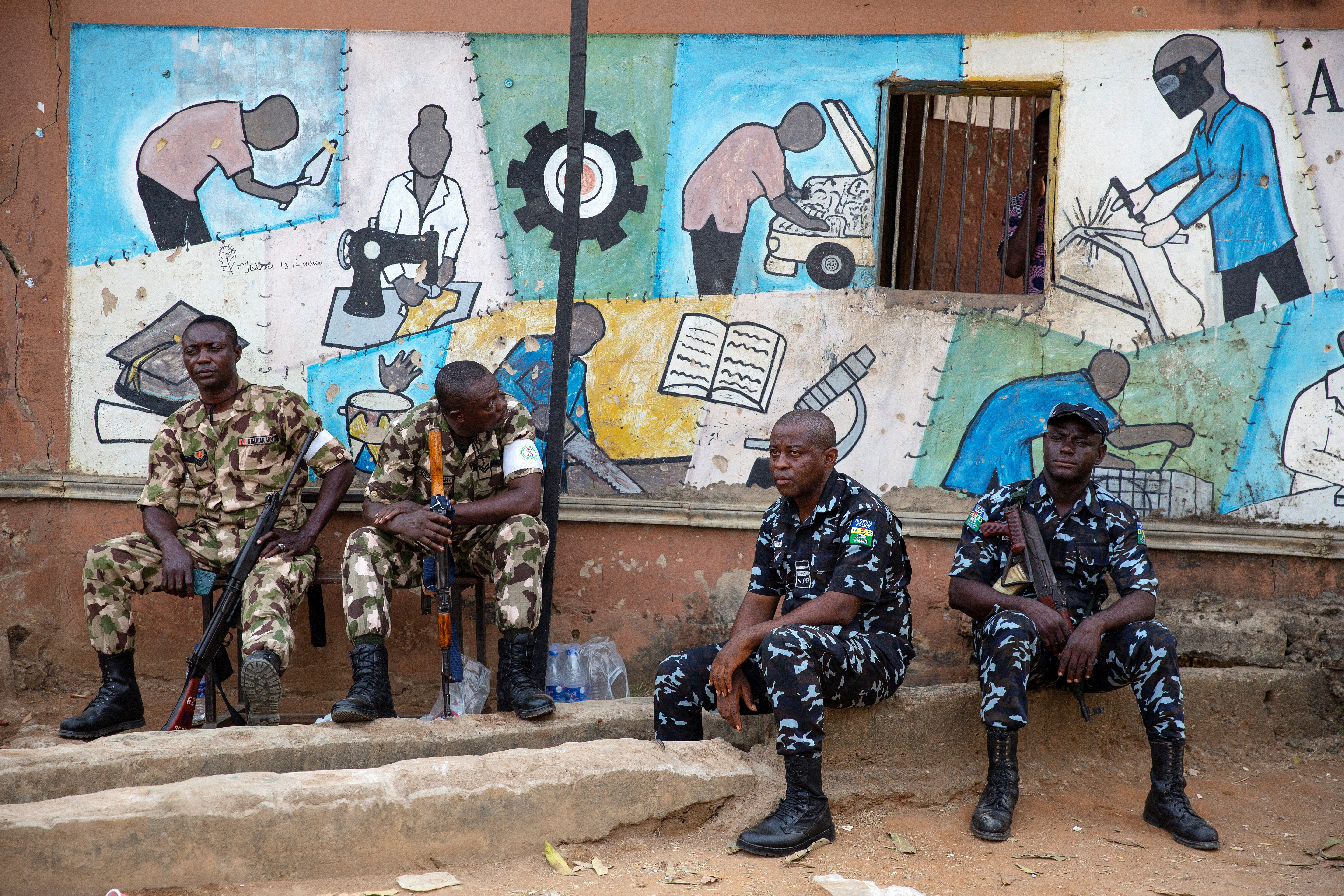 Soldiers and police guard vote counting centre in Lagos, Nigeria
